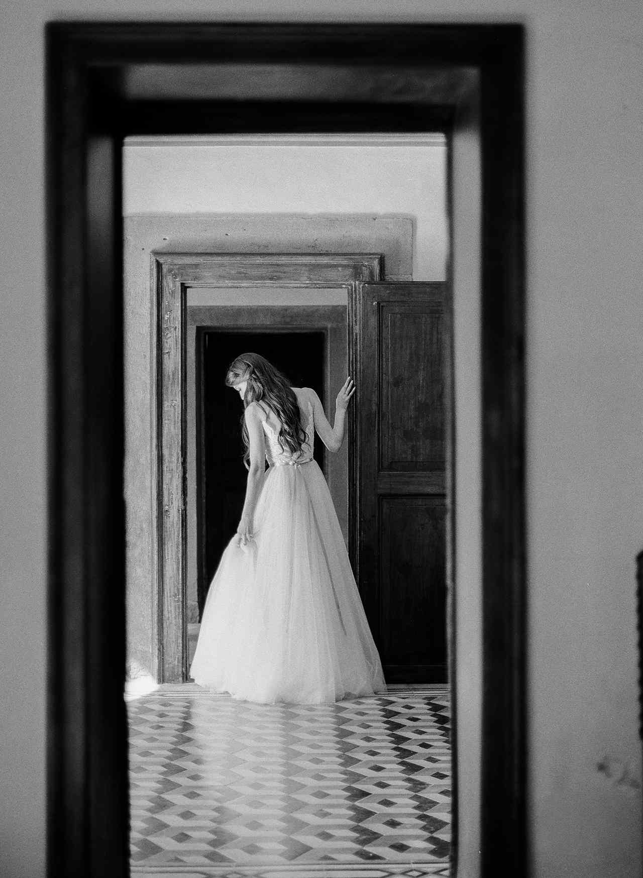 doorway view bride dress and hairstyle