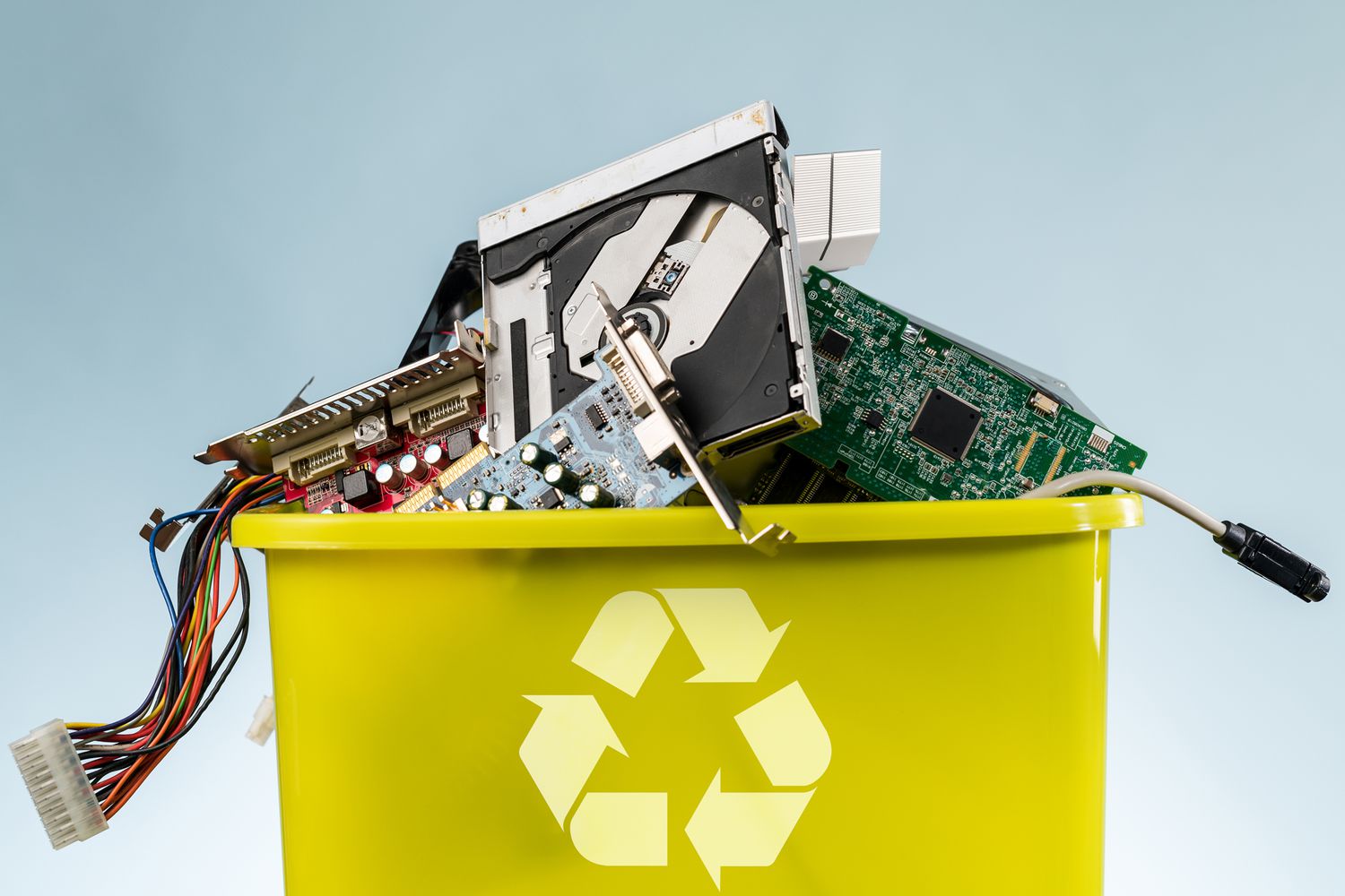 recycling bin filled with electronics