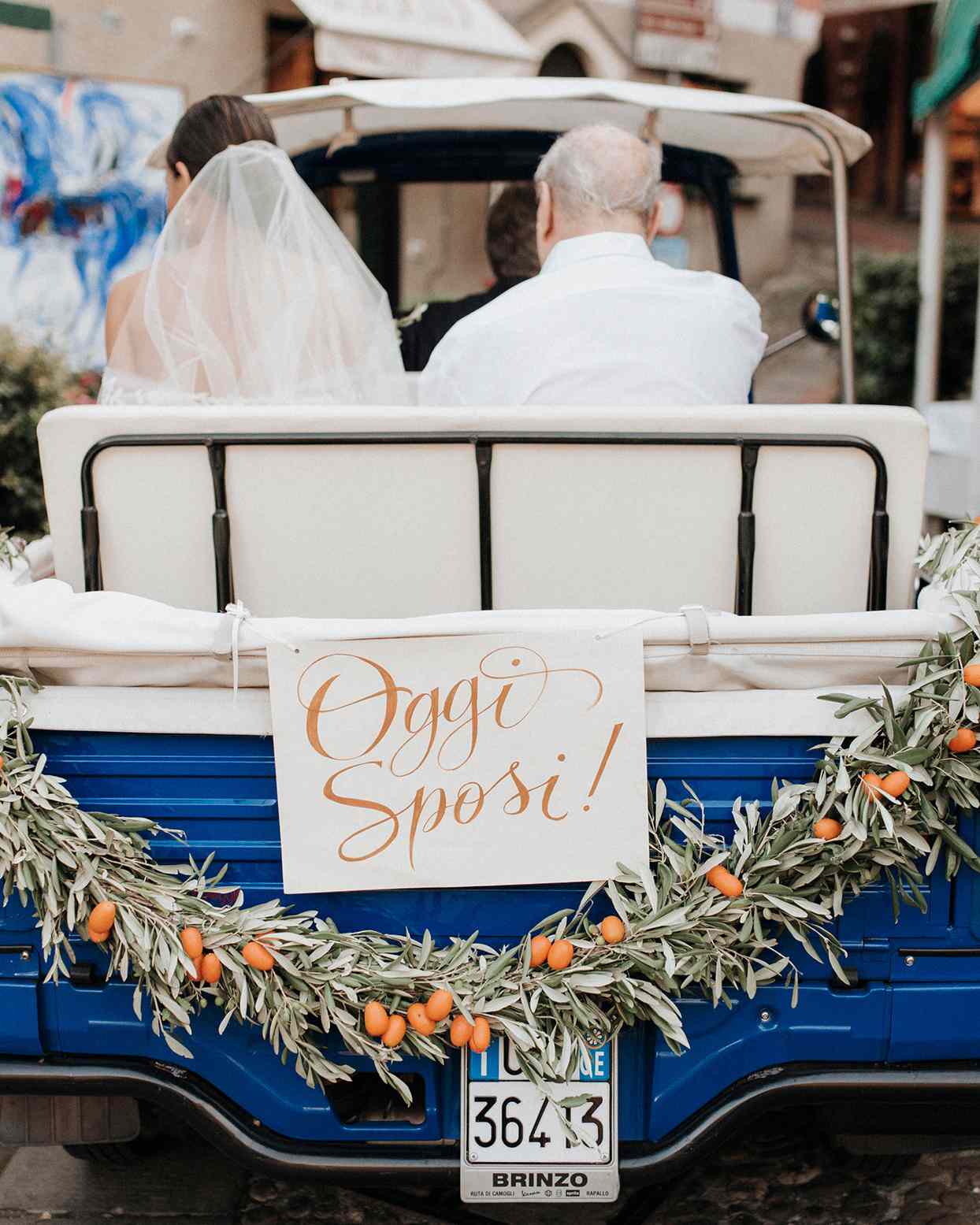 jaclyn antonio wedding bride and father in cart