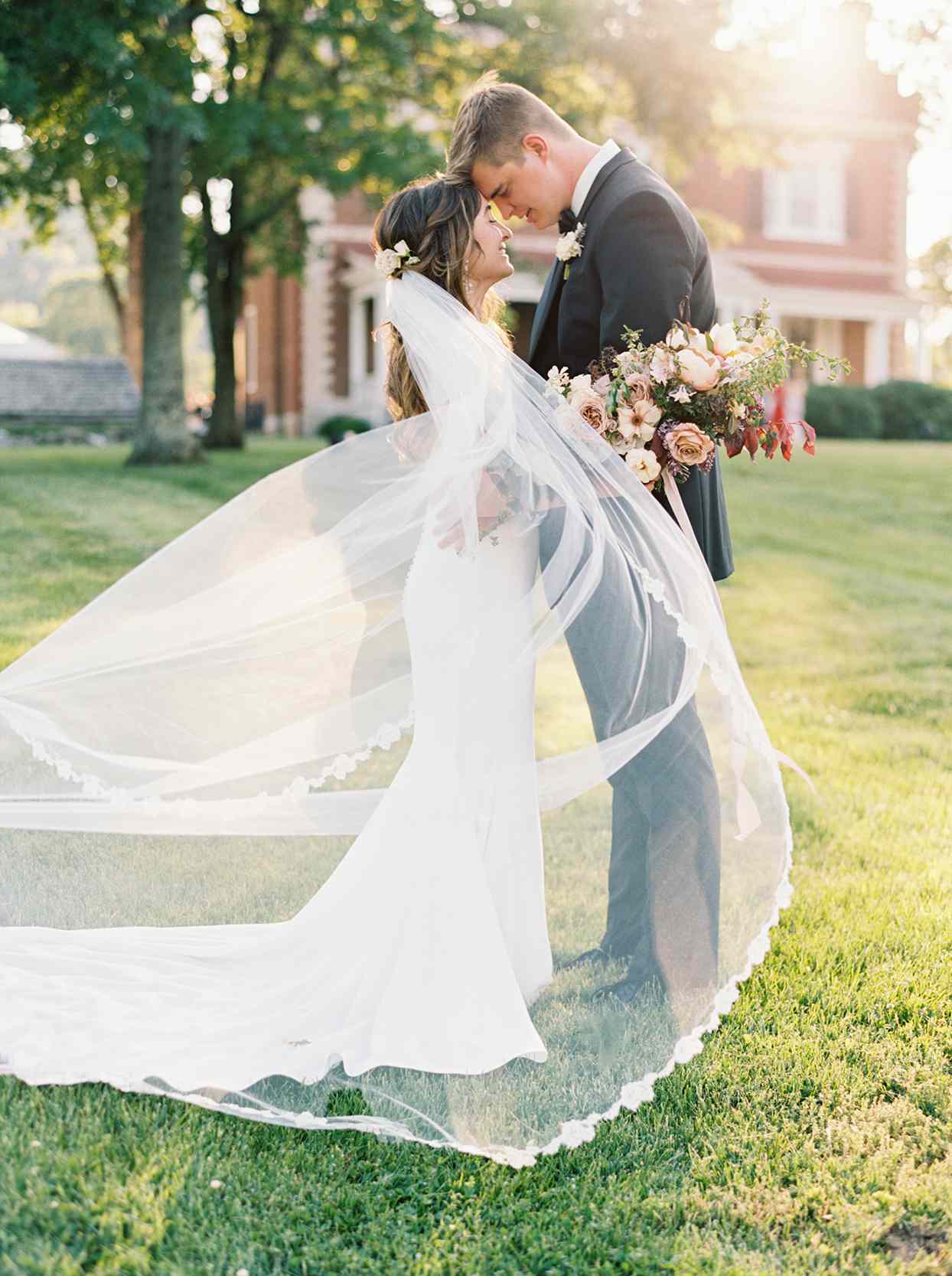 julia doug wedding couple veil blowing in wind