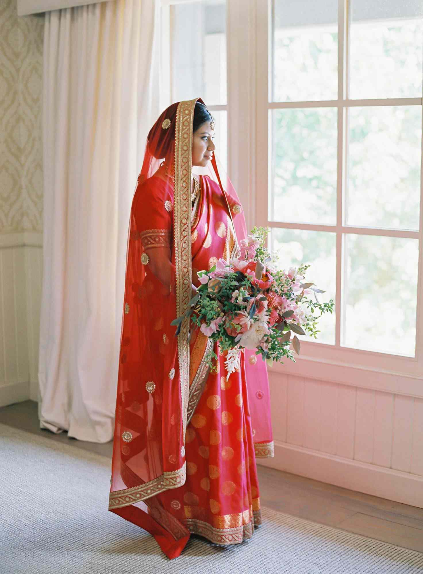 ronita ryan wedding bride gazing out of window in veil