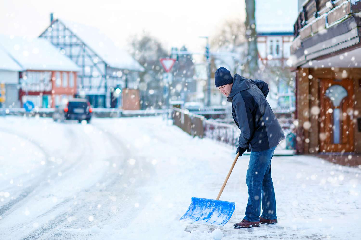 man shoveling snow