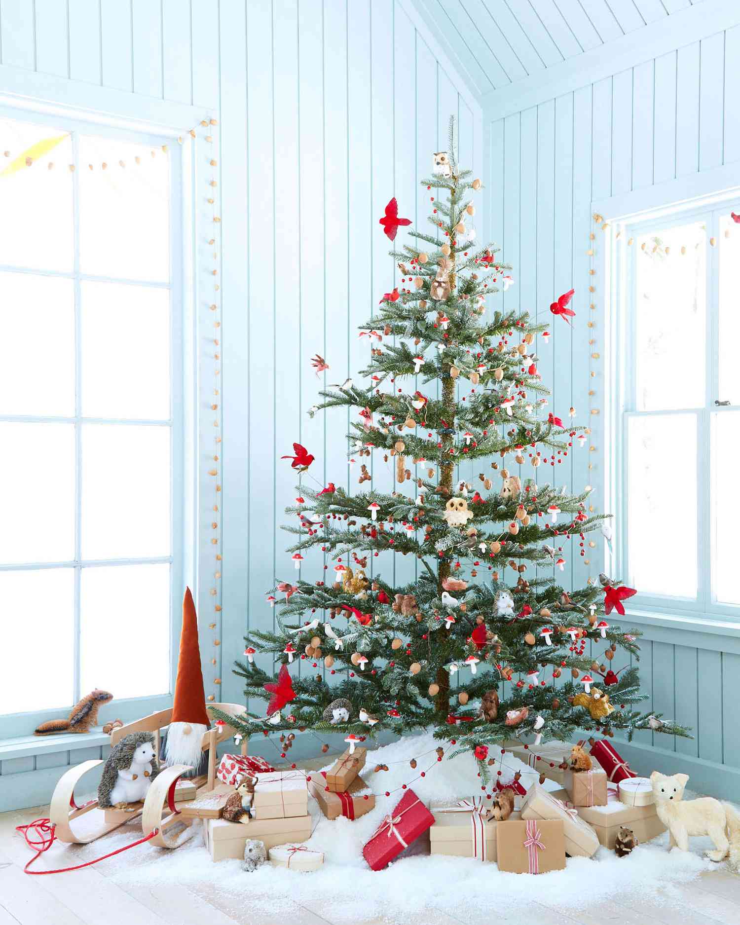 Christmas tree decorated with woodland creatures red birds