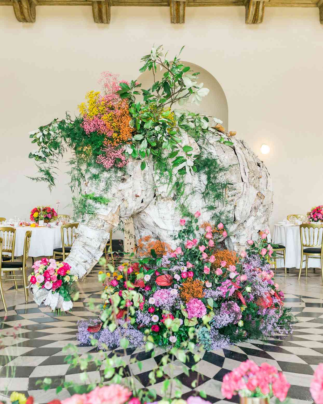life sized asian elephant centerpiece decorated with floral display