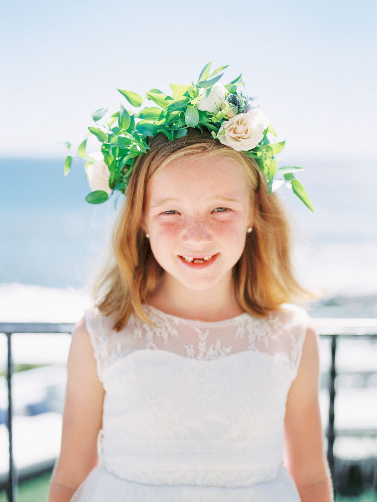 bettina gino wedding flower girl in white with hair wreath
