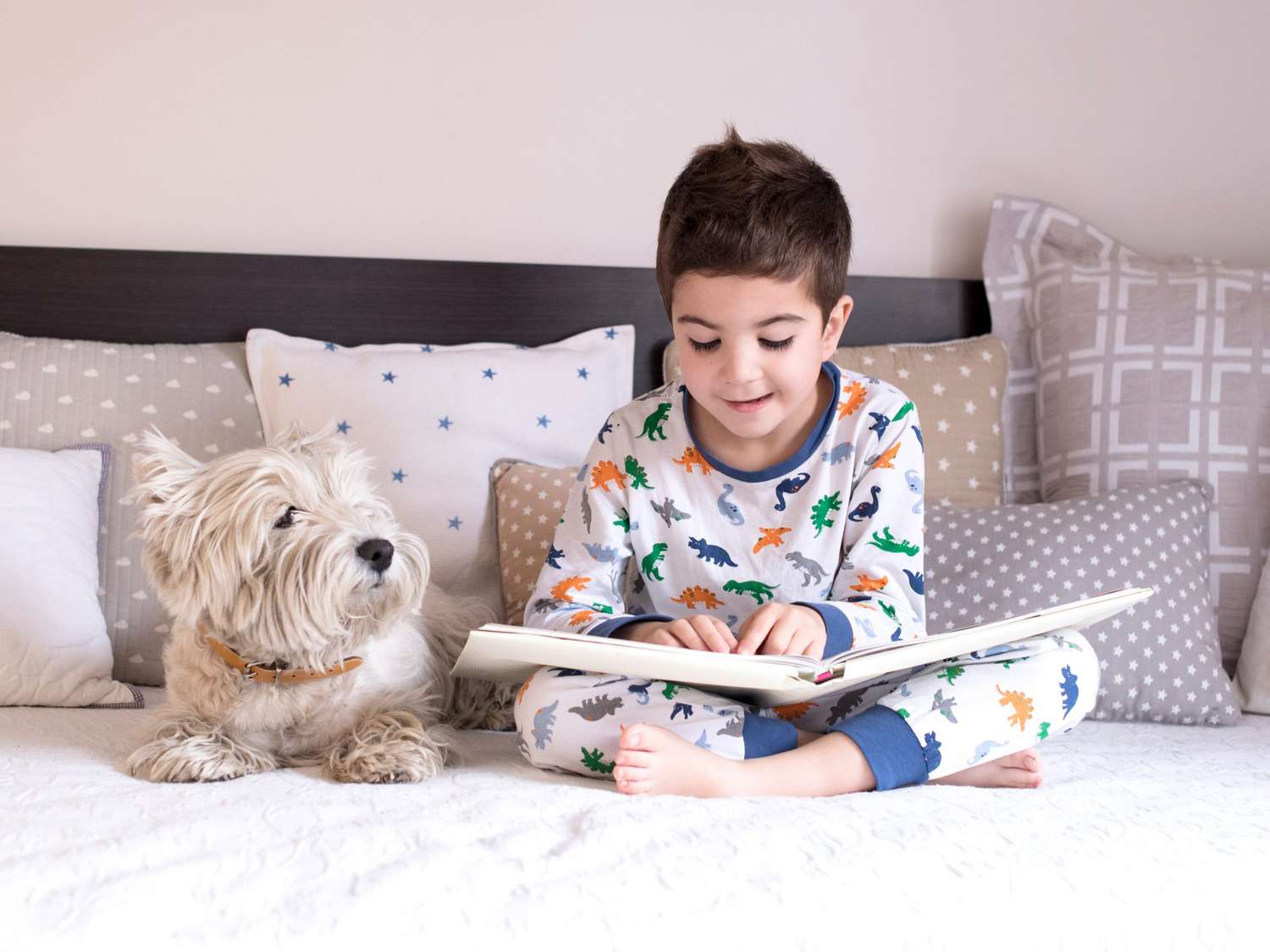 Kids in Bedroom Reading with Dogs