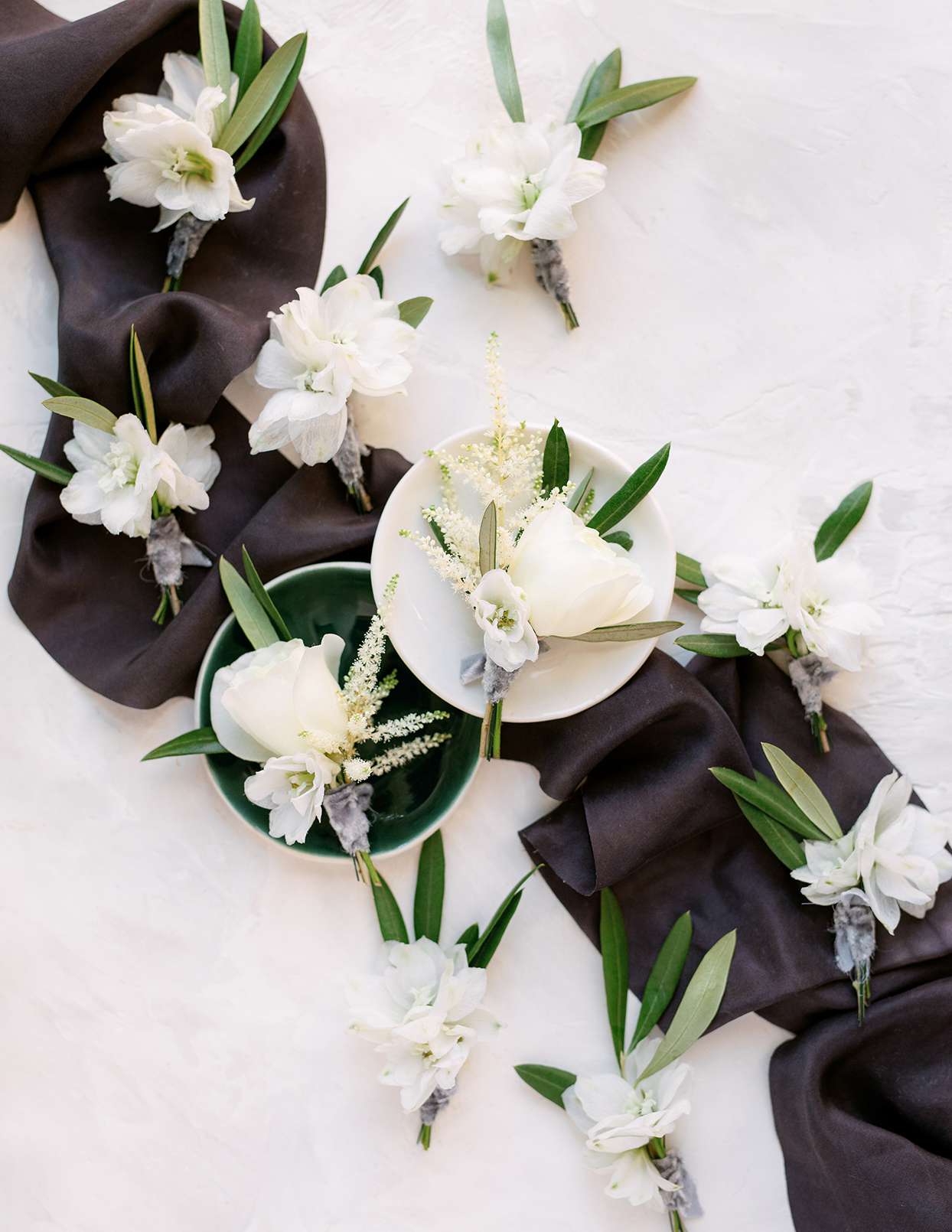 jason justin white floral wedding boutonnieres