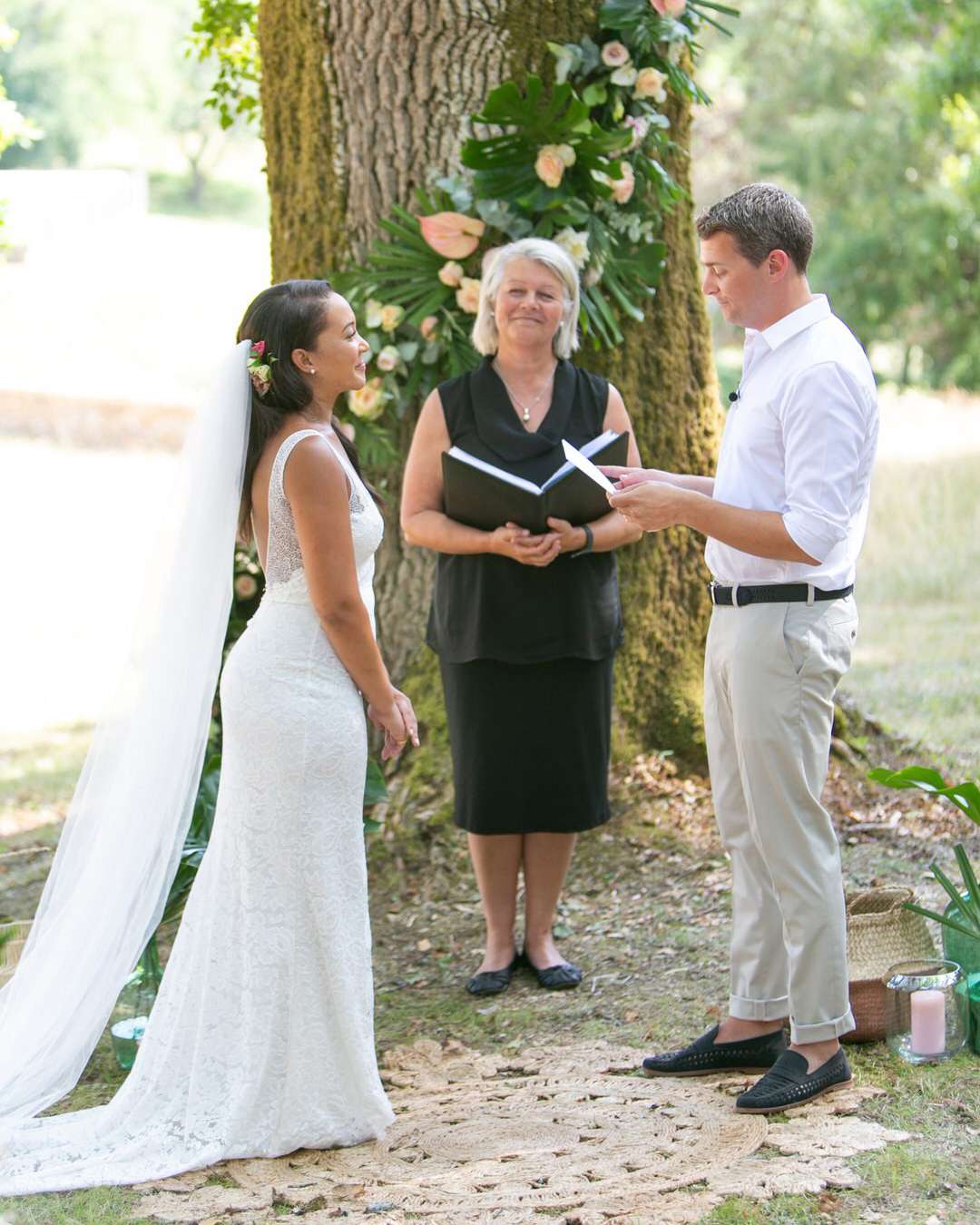 jen tim wedding ceremony in front of tree