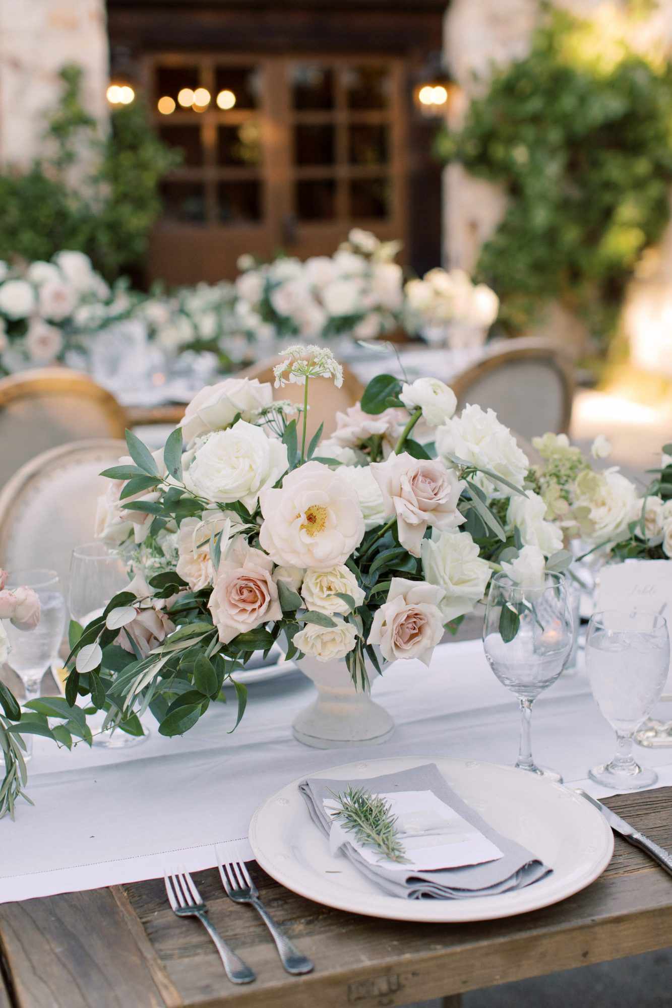 wedding place settings and floral centerpiece