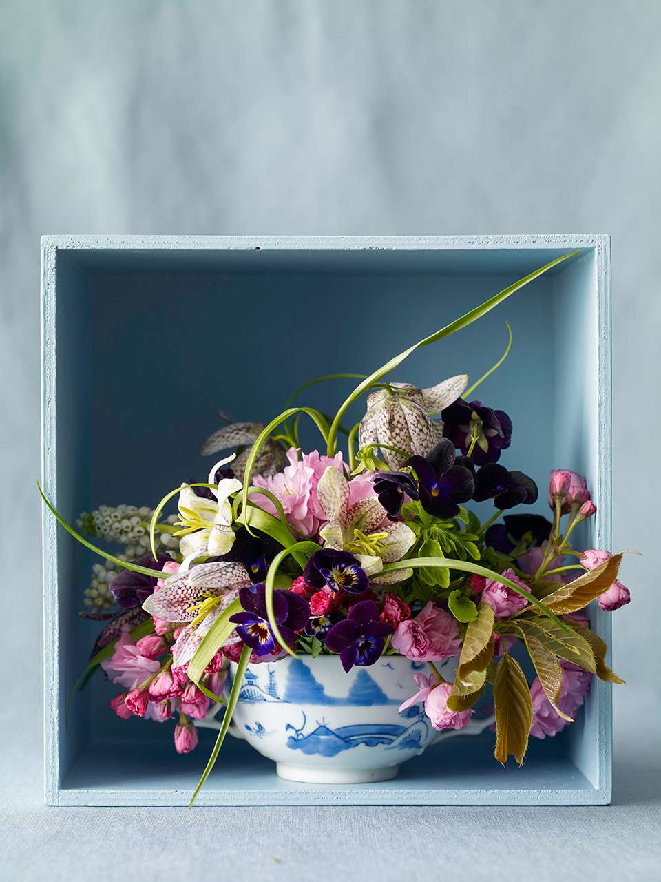 Dutch delft gravy bowl floral arrangement