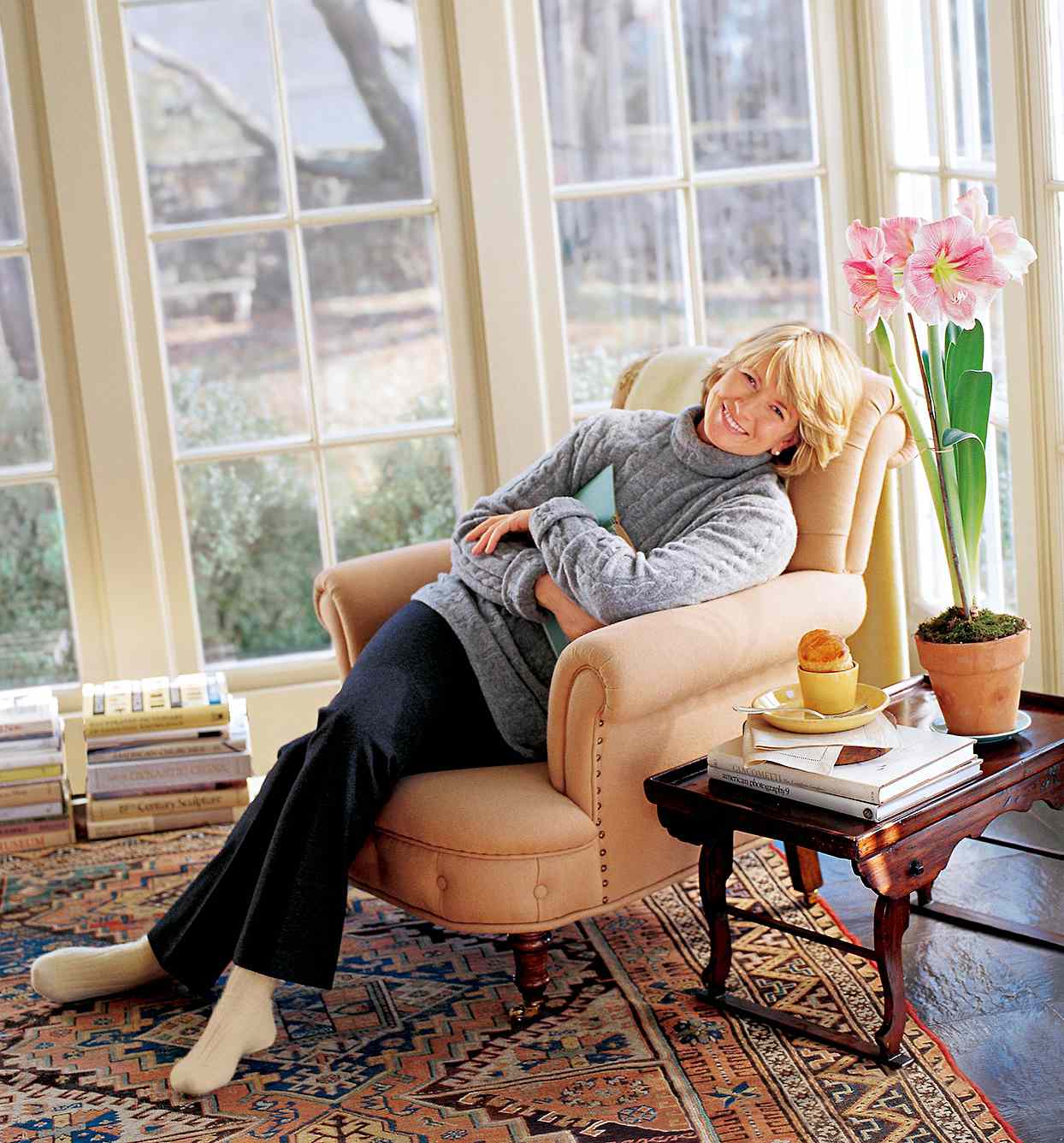 Martha Stewart sitting on chair in February 1998