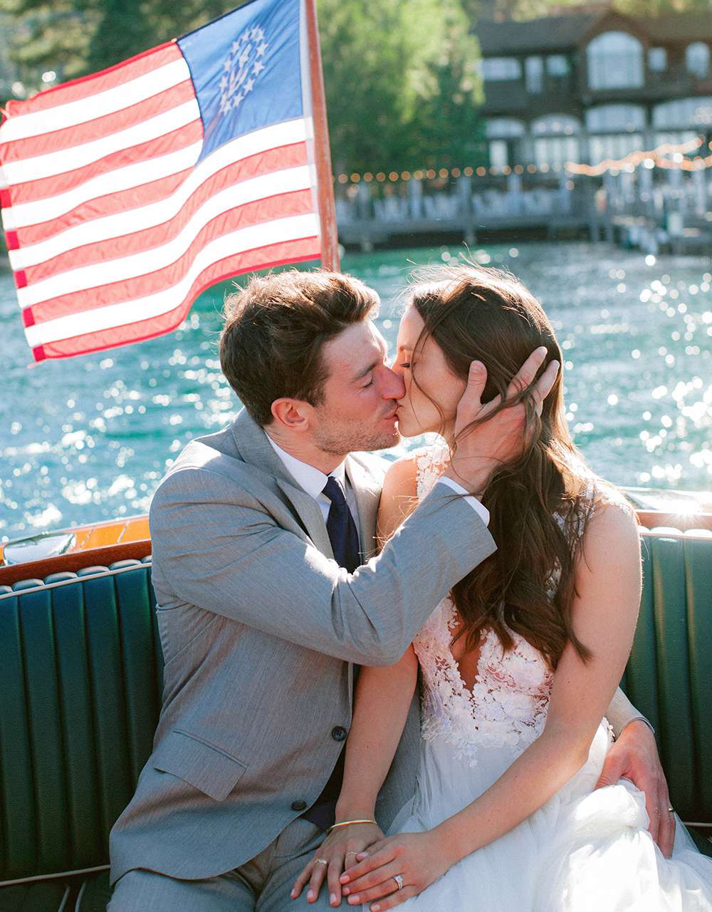 wedding couple kiss boat ride