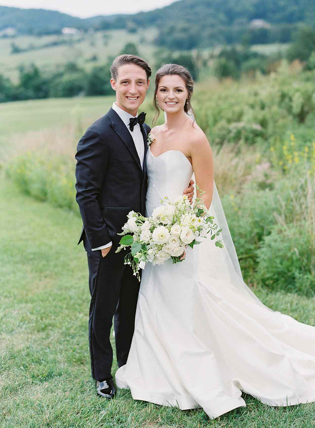 wedding couple posing for portrait on Virginia farm