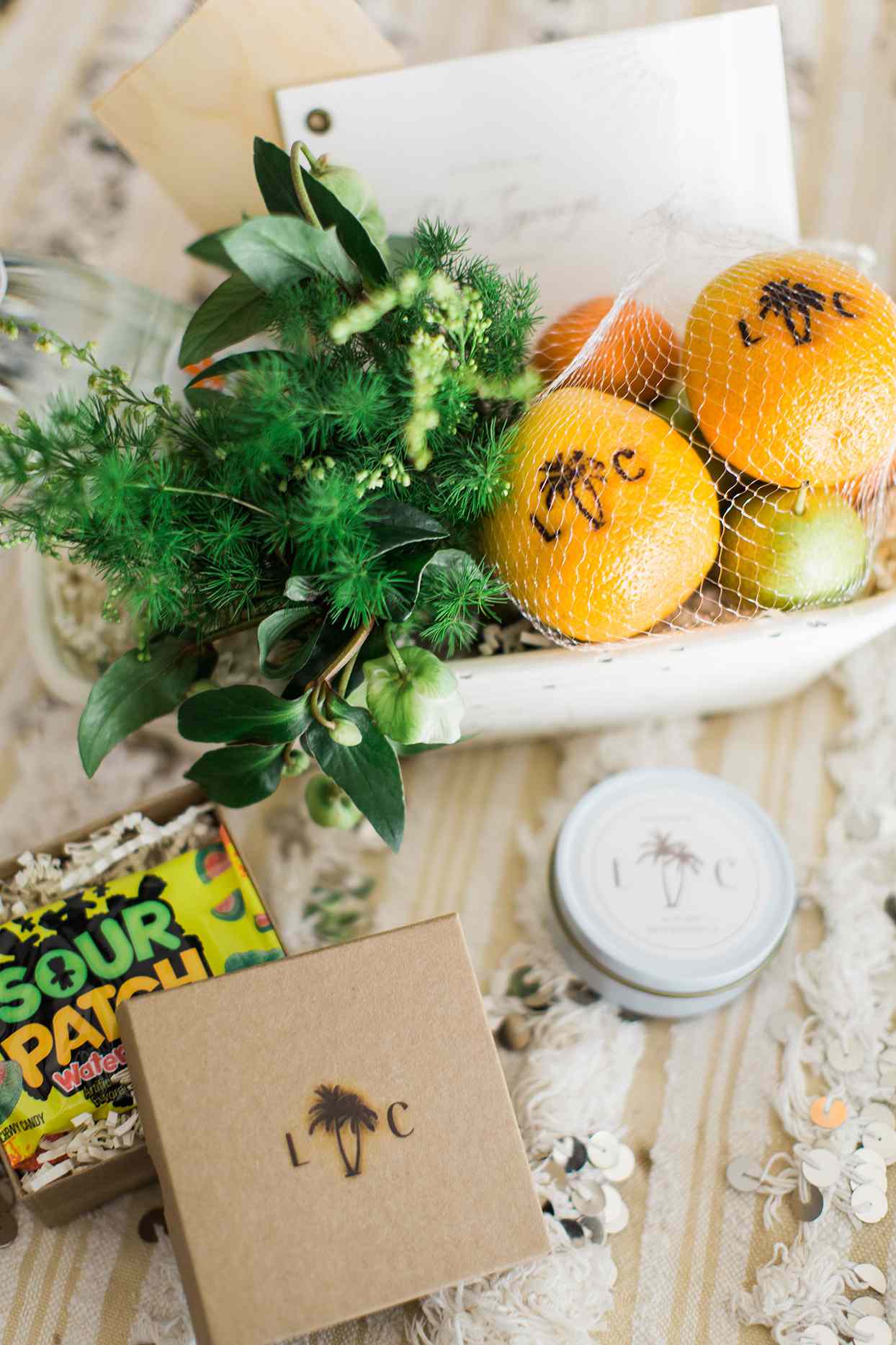wedding welcome bags with citrus fruits and sour patch kids
