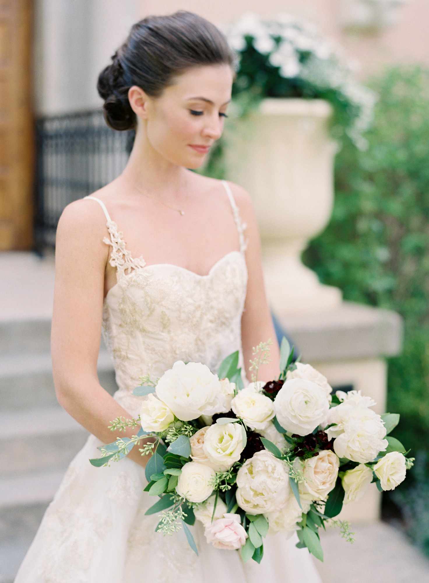 portrait of bride holding bouquet