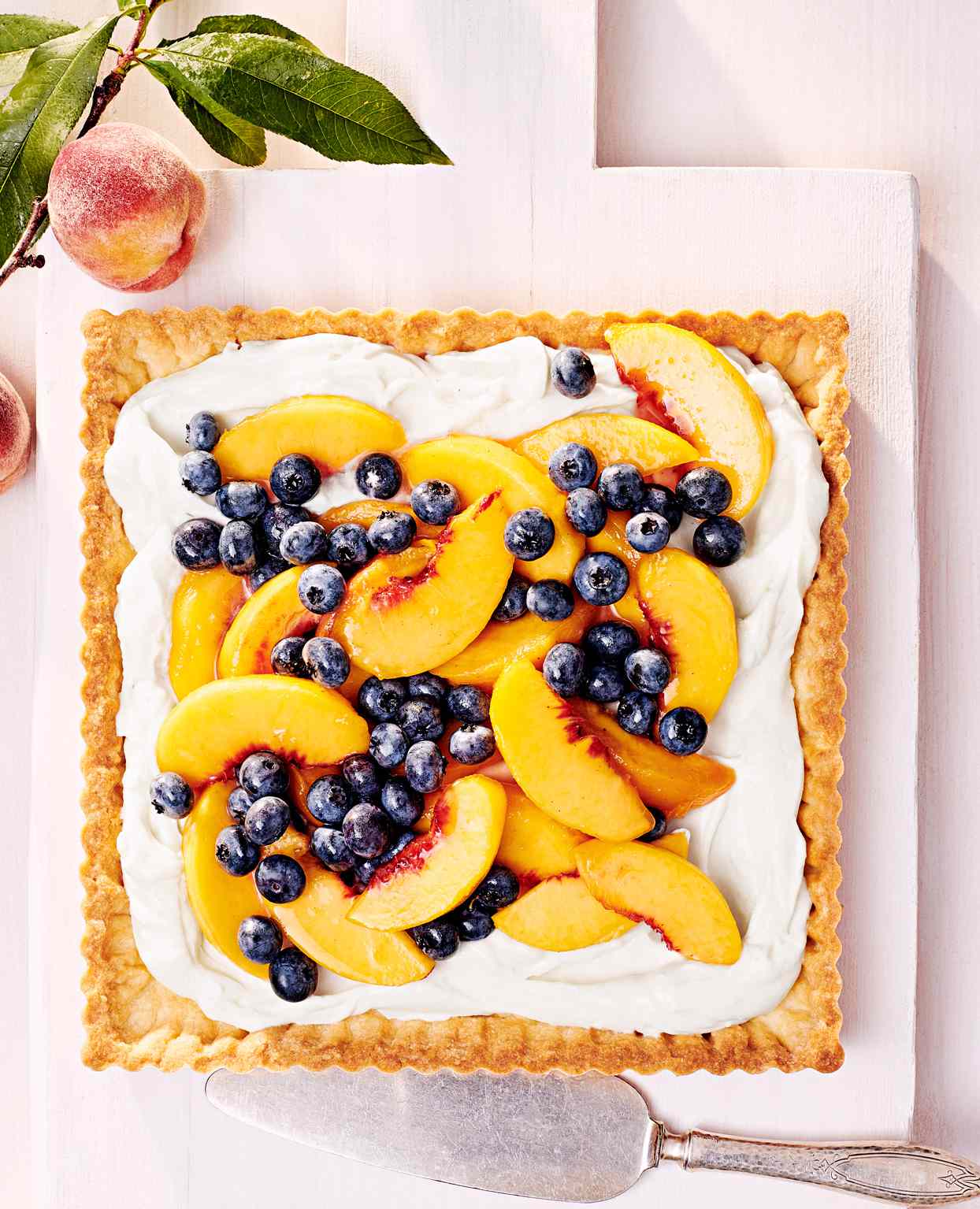 peach and blueberry tart with cream cheese filling