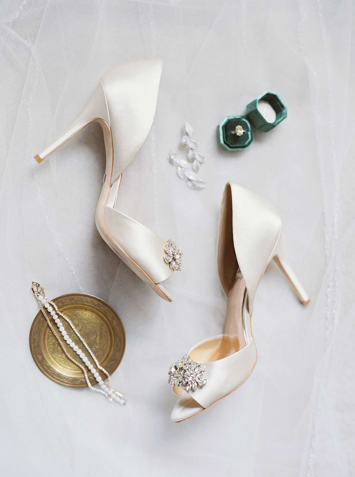 bride's elegant white heels, jewelry