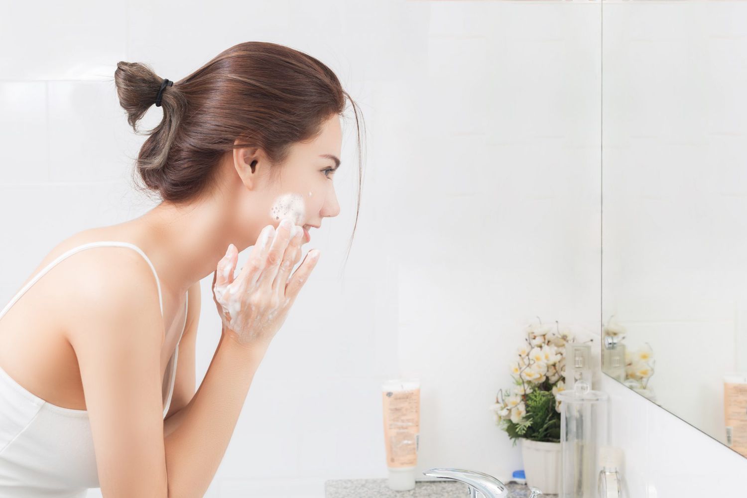 Young Woman Washing Her Face