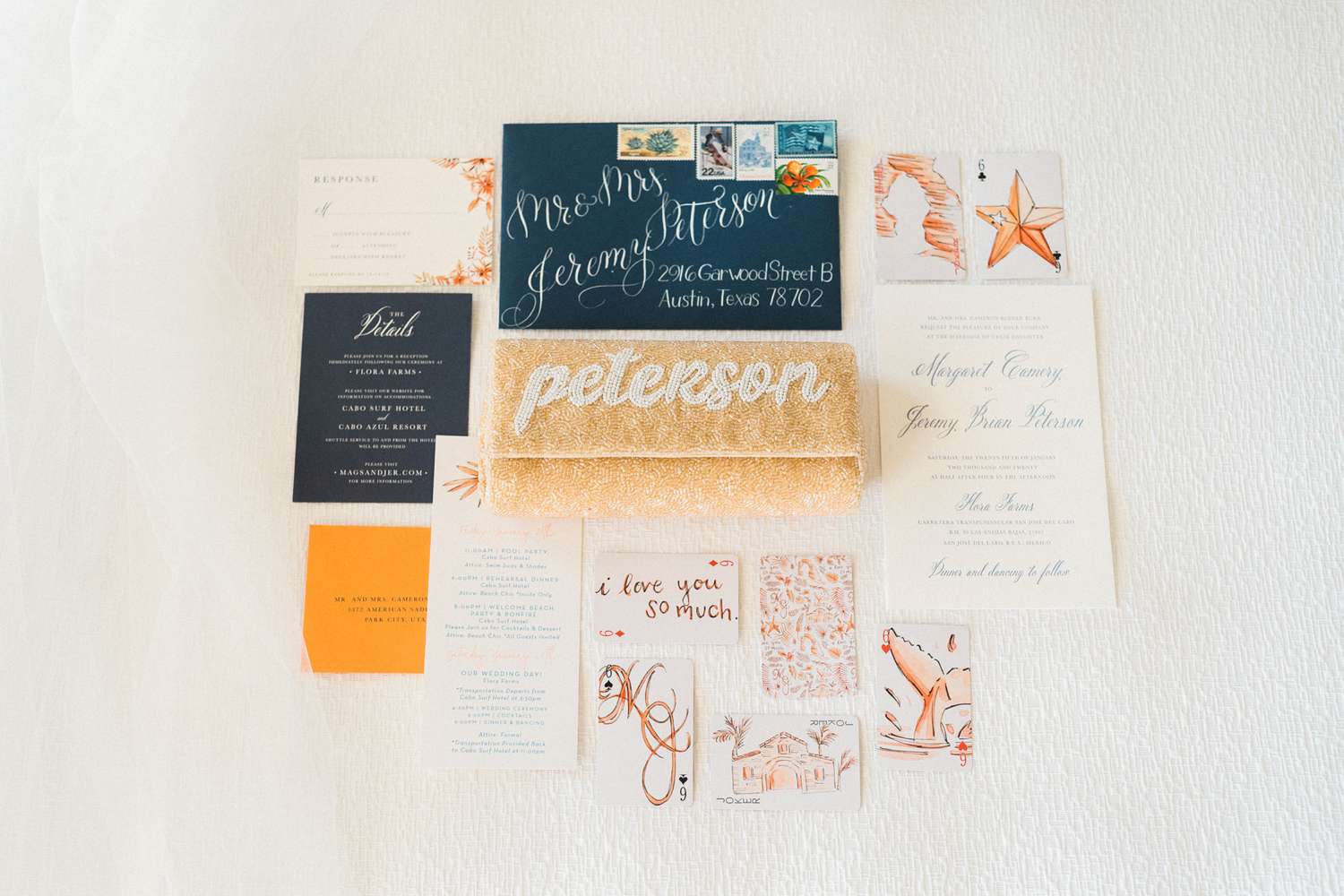 orange, blue and white wedding invitation suite