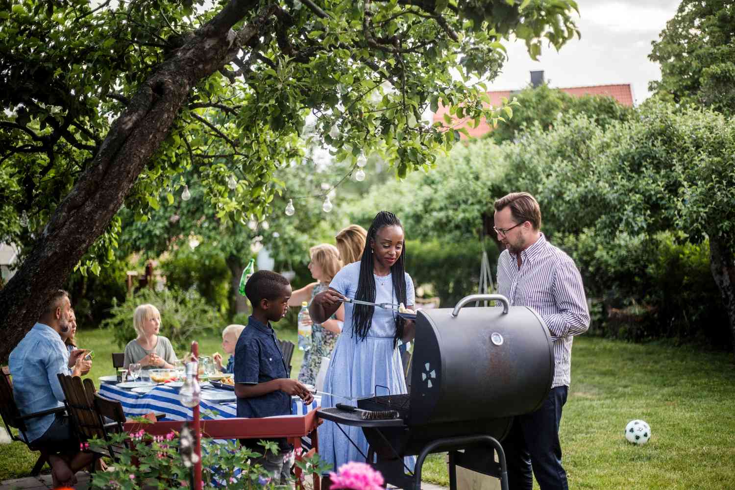 people enjoying an outdoor summer BBQ