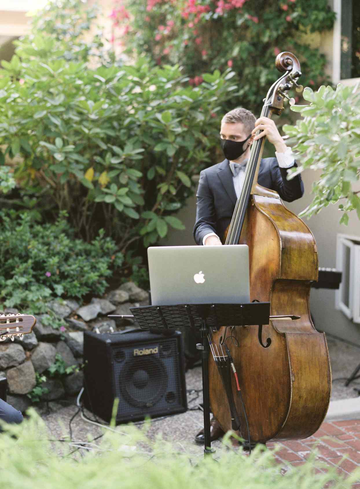 upright bass player at small wedding ceremony