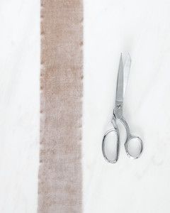 diy scrunchie fabric strip and scissors