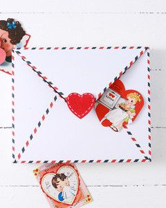 vintage valentines atop envelope valentine box