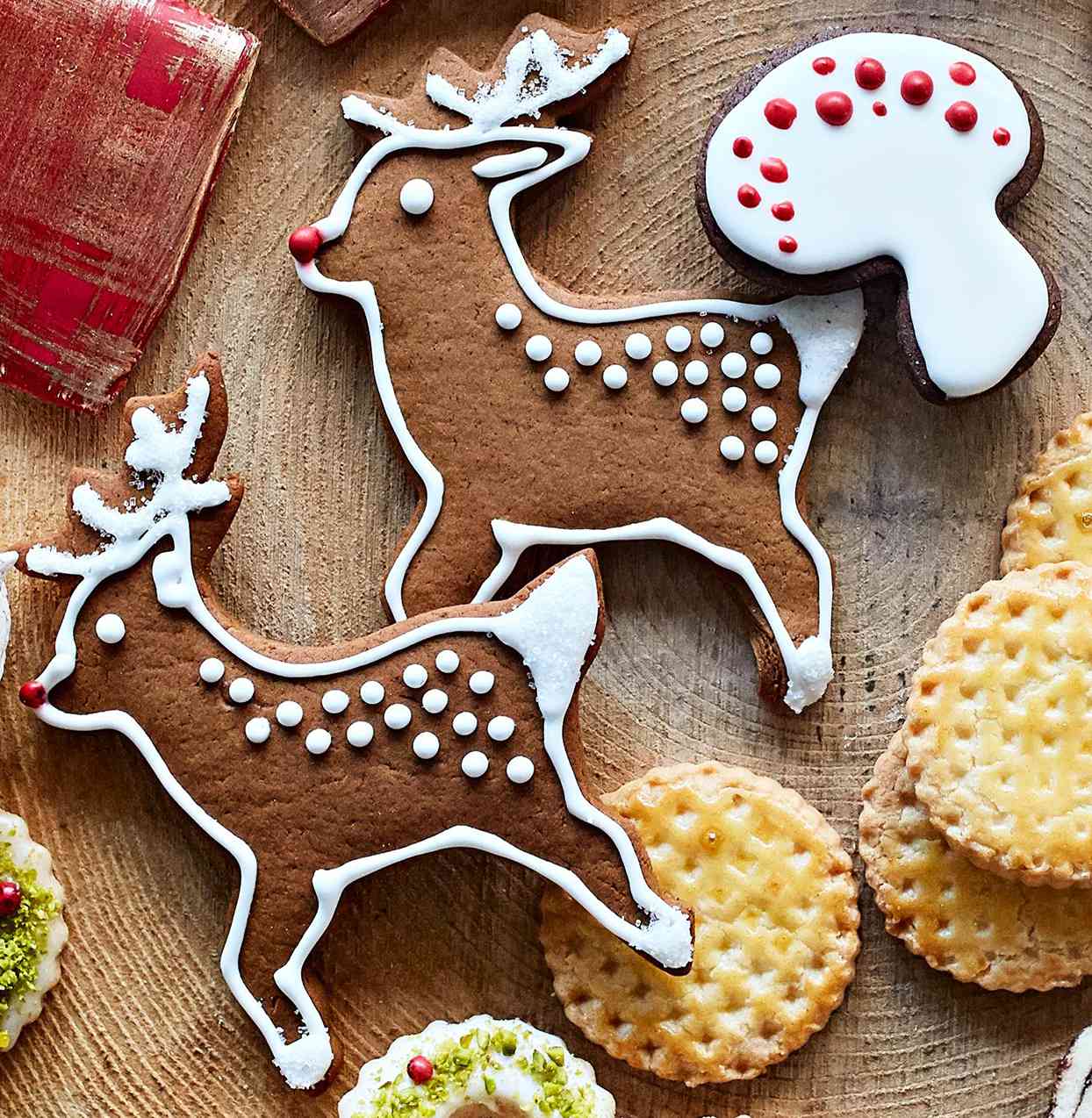 royal icing mushroom and reindeer gingerbread cookies