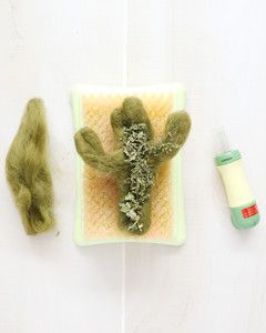 dried catnip sprinkled on green felt cactus
