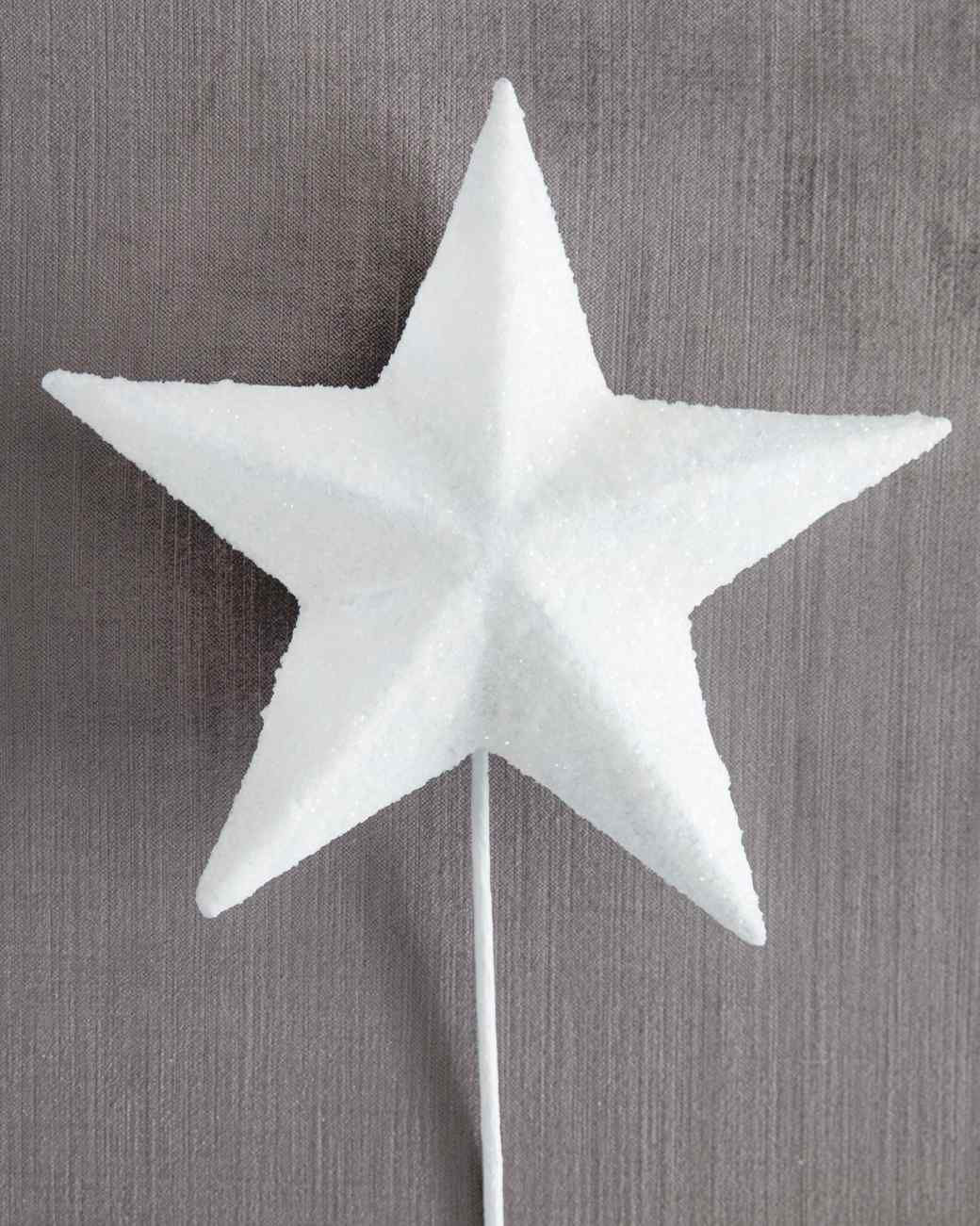 white glittered star tree topper