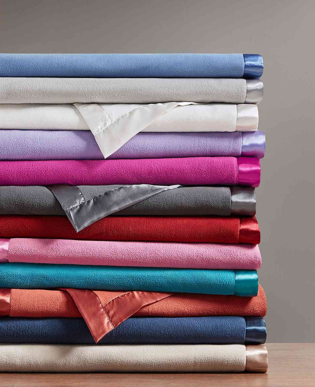 stack of Martha Stewart Collection Soft Fleece Queen Blanket