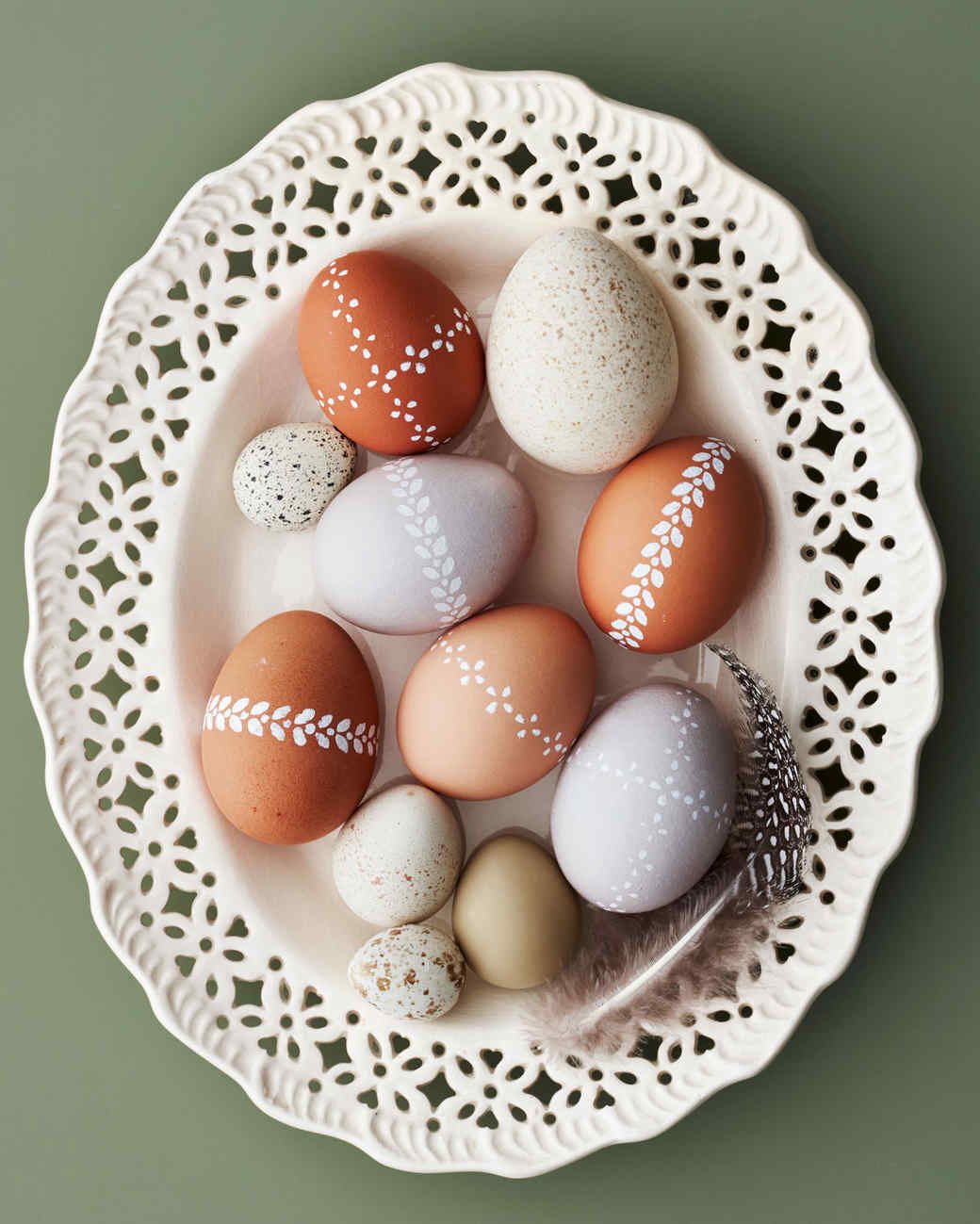 lace-painted easter eggs in an ivory dish
