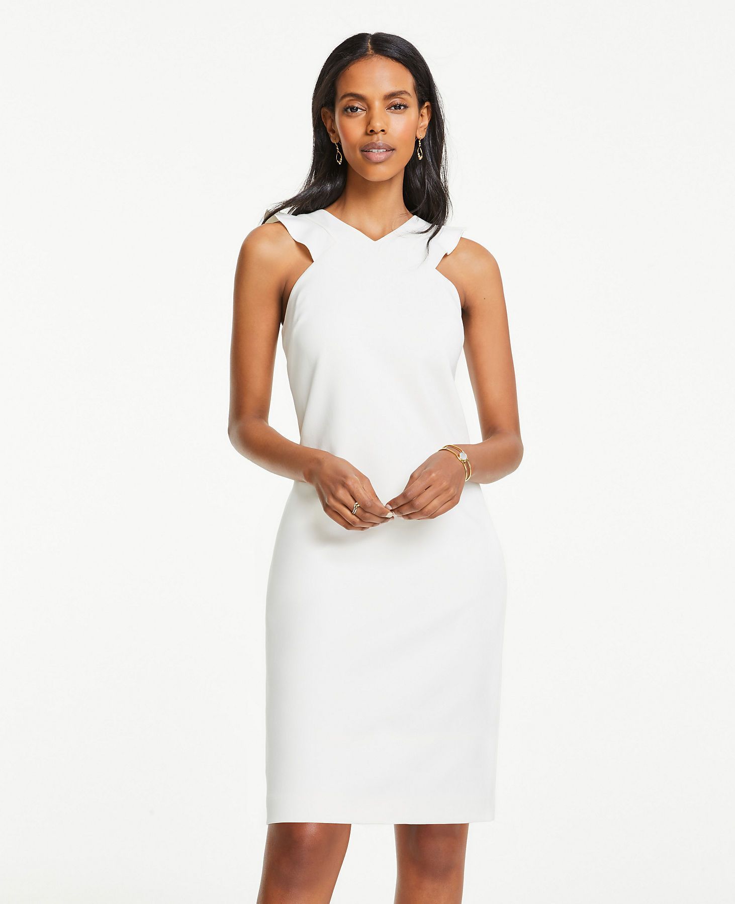knee-length white dress on model