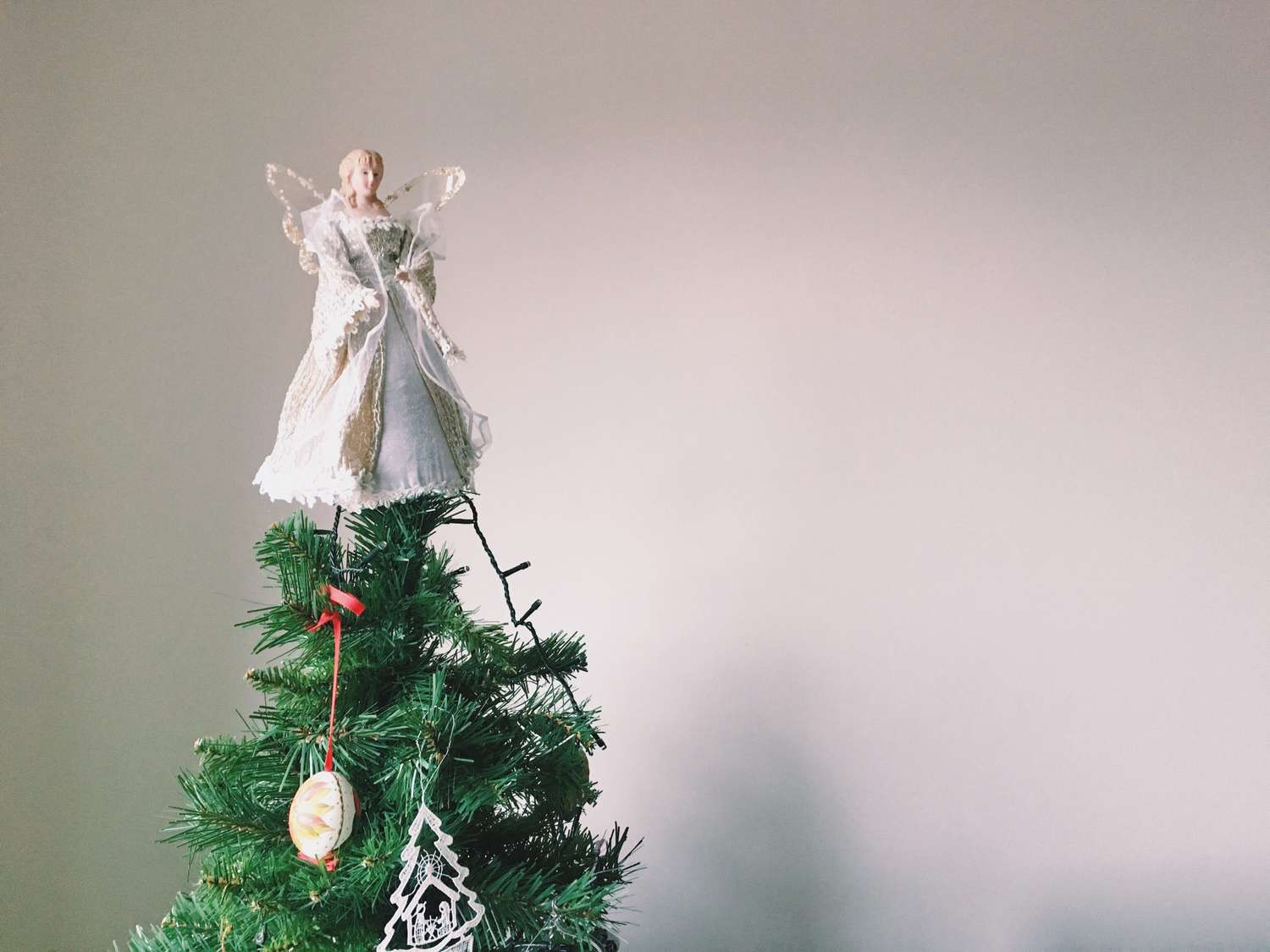 angel atop christmas tree