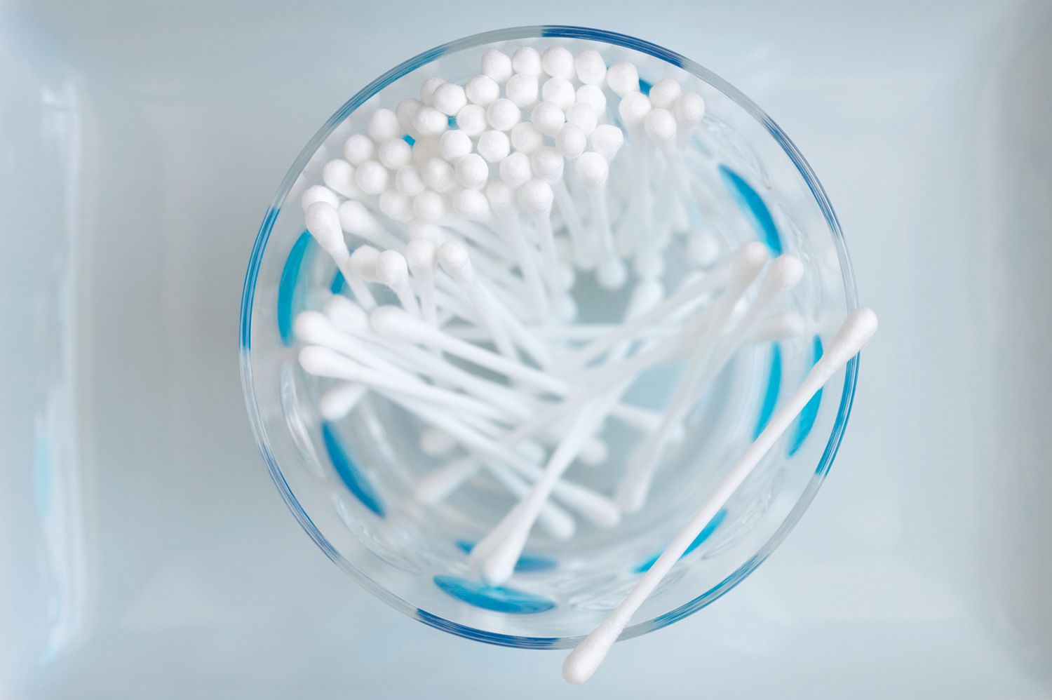 glass filled with q-tips