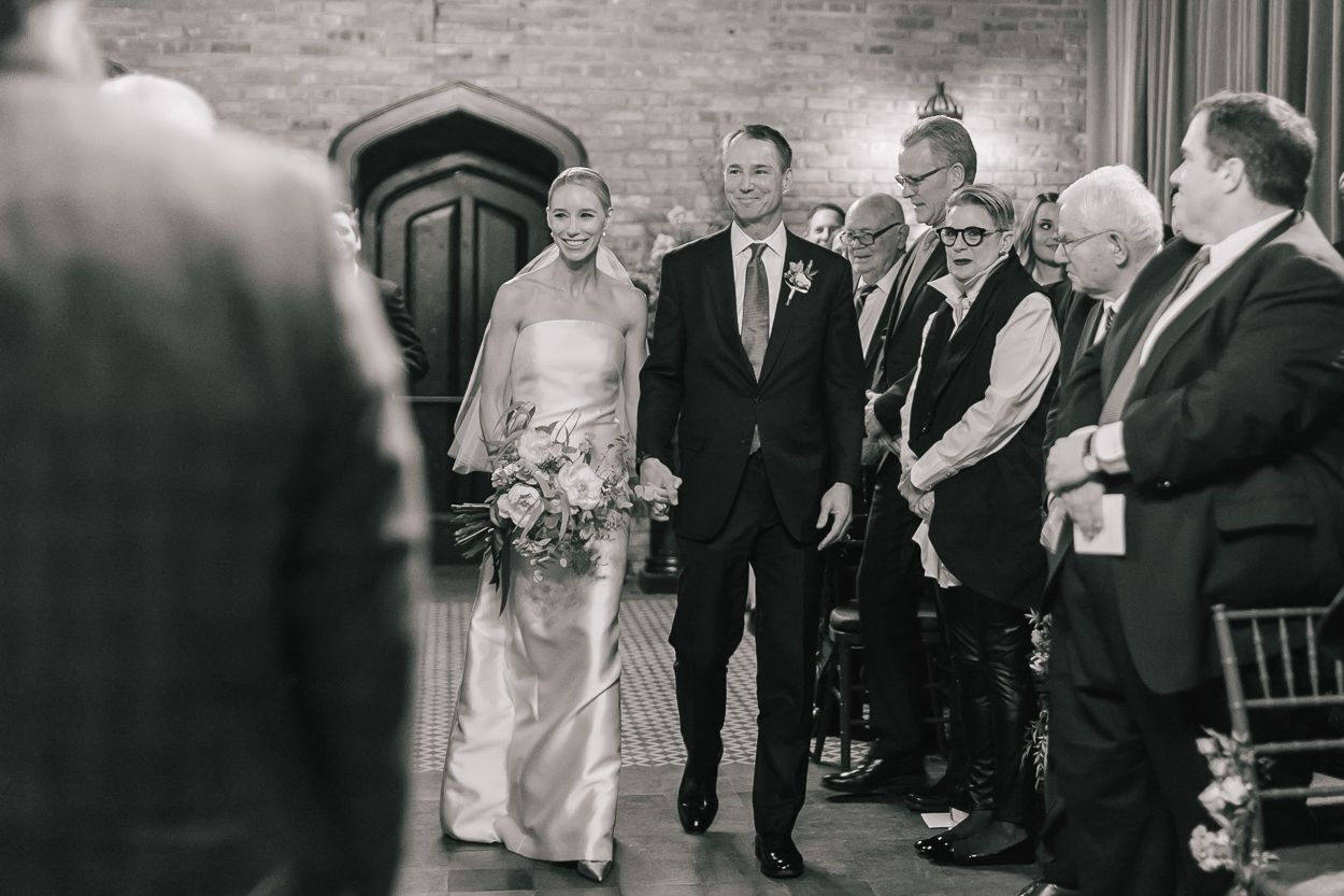 bride and father walking down aisle for wedding