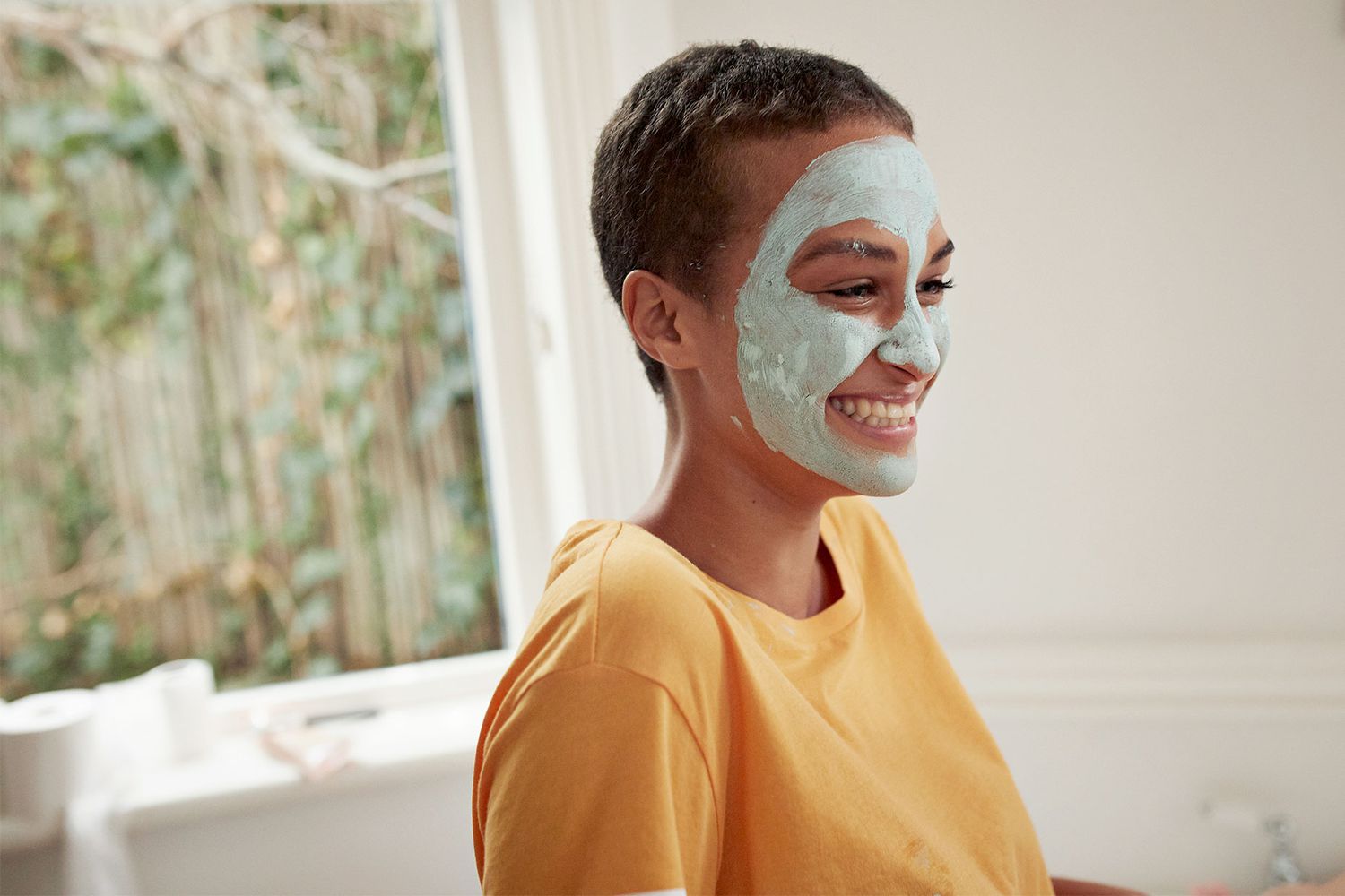 woman with skincare face mask on