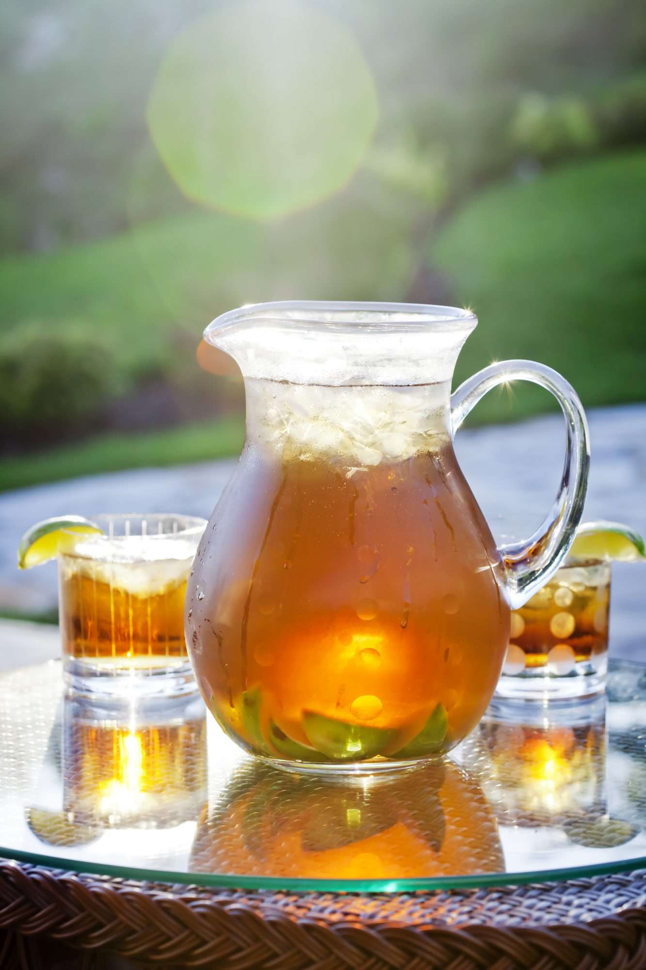 cold ice tea in pitcher outdoors