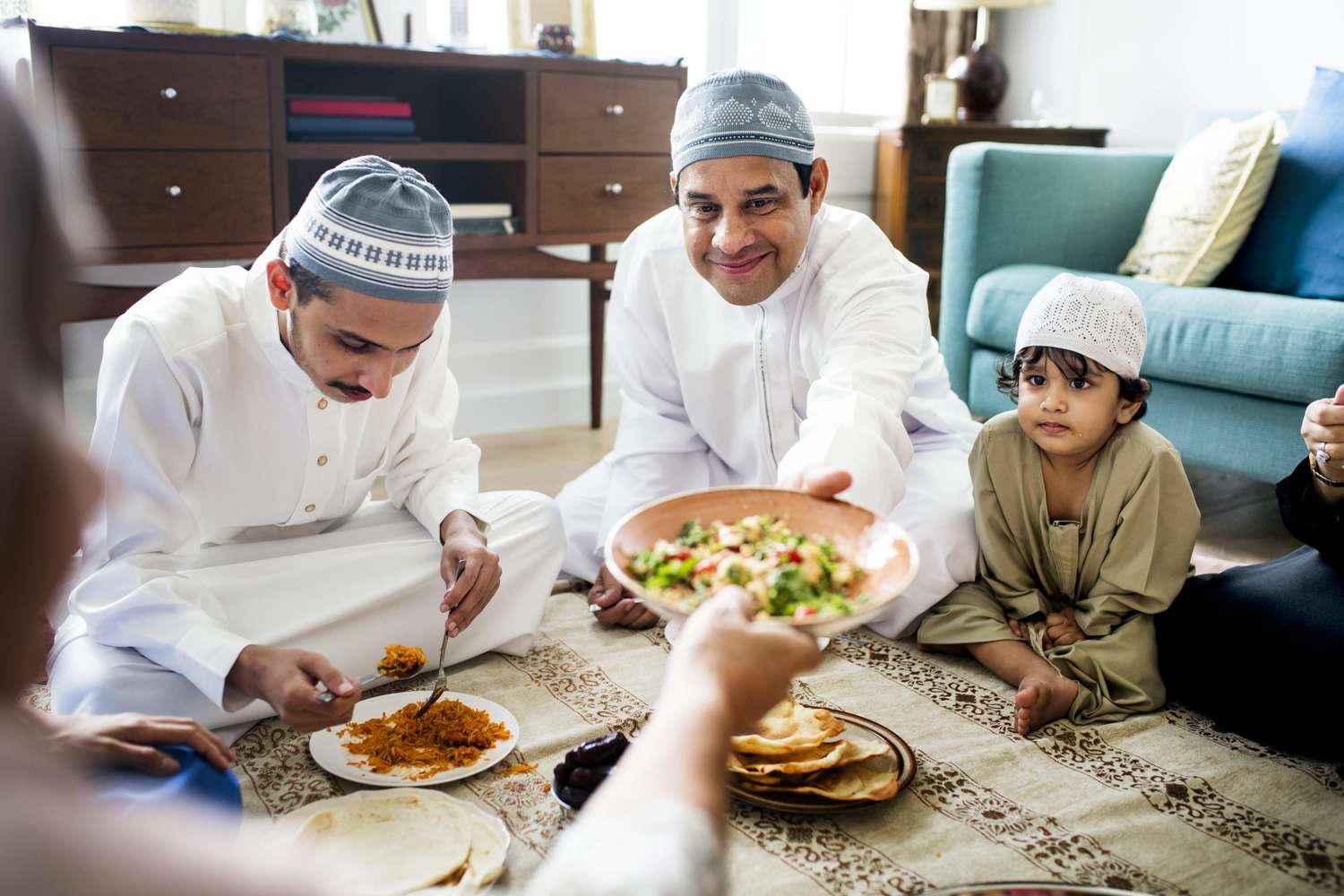 family celebrating ramadan sharing food