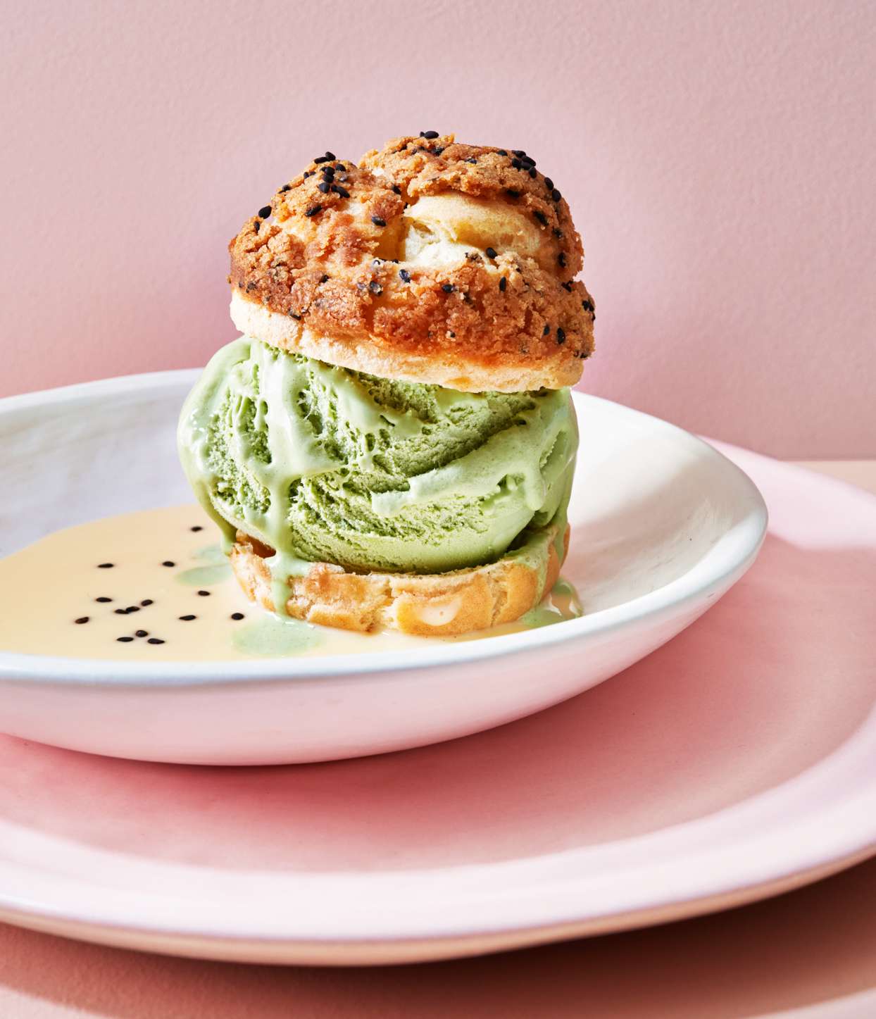 green-tea profiteroles served in a pool of creme anglaise