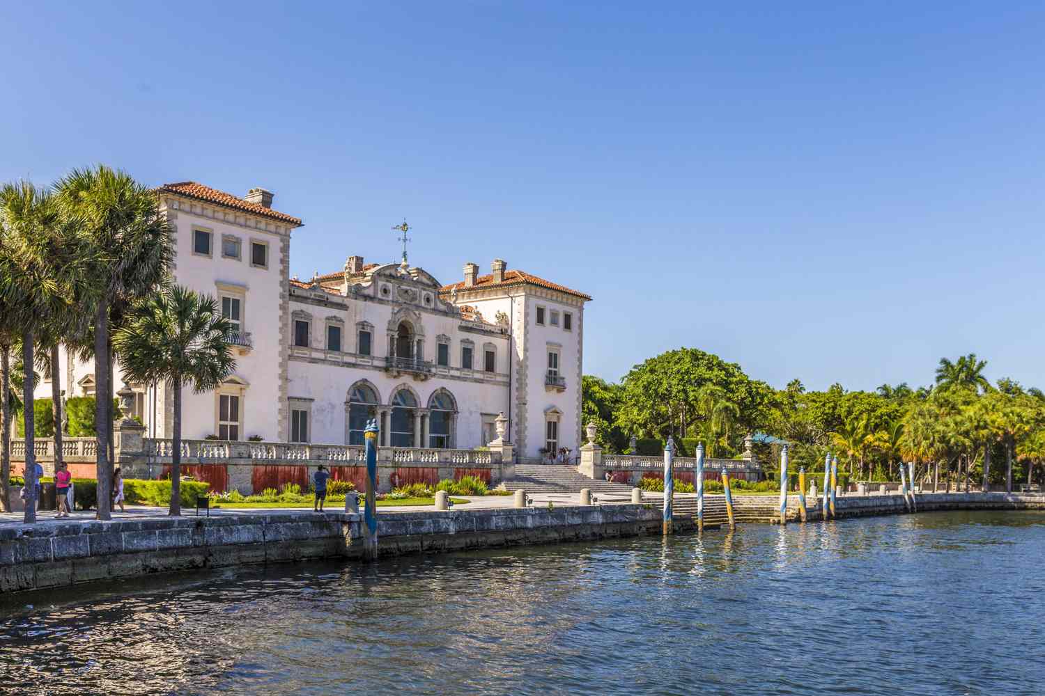 Miami Vizcaya museum at waterfront under blue sky
