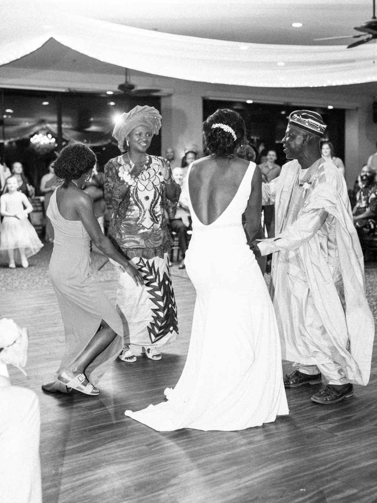 family dancing at wedding reception