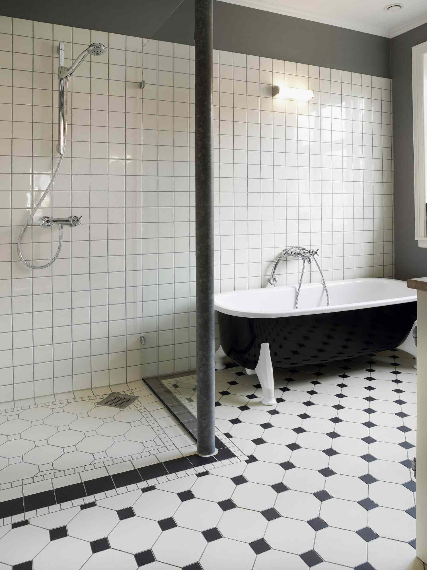 bathroom with black and white tile