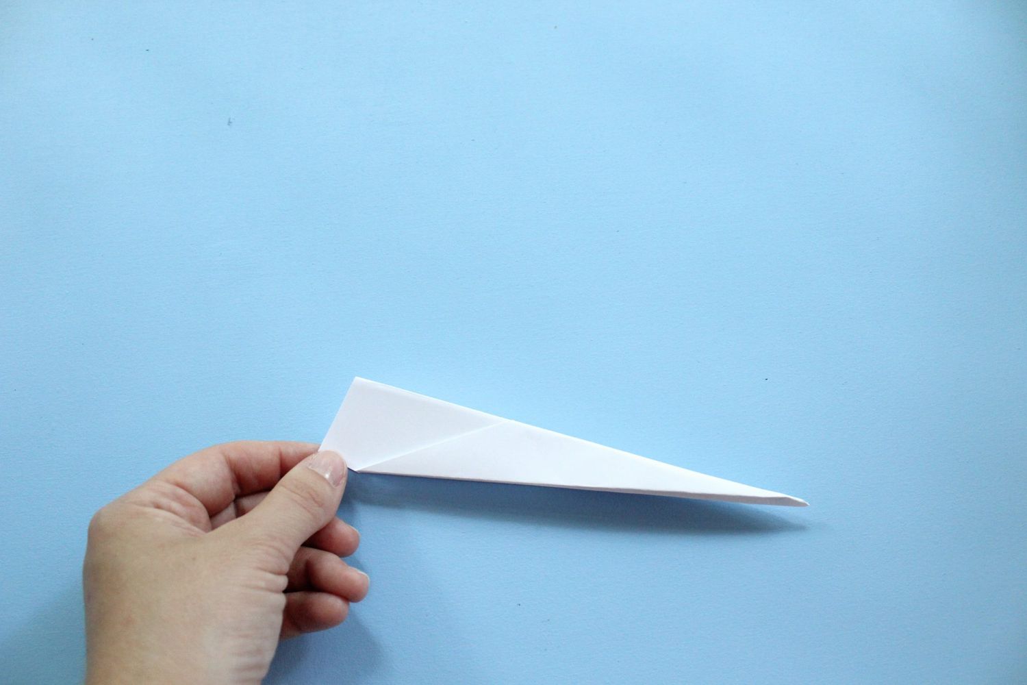 folding paper airplane step 5