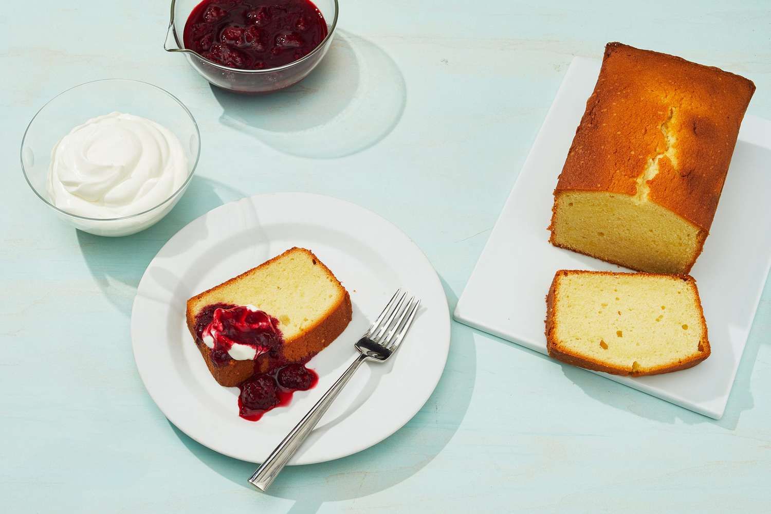 cream cheese pound cake with jam on sea foam green table
