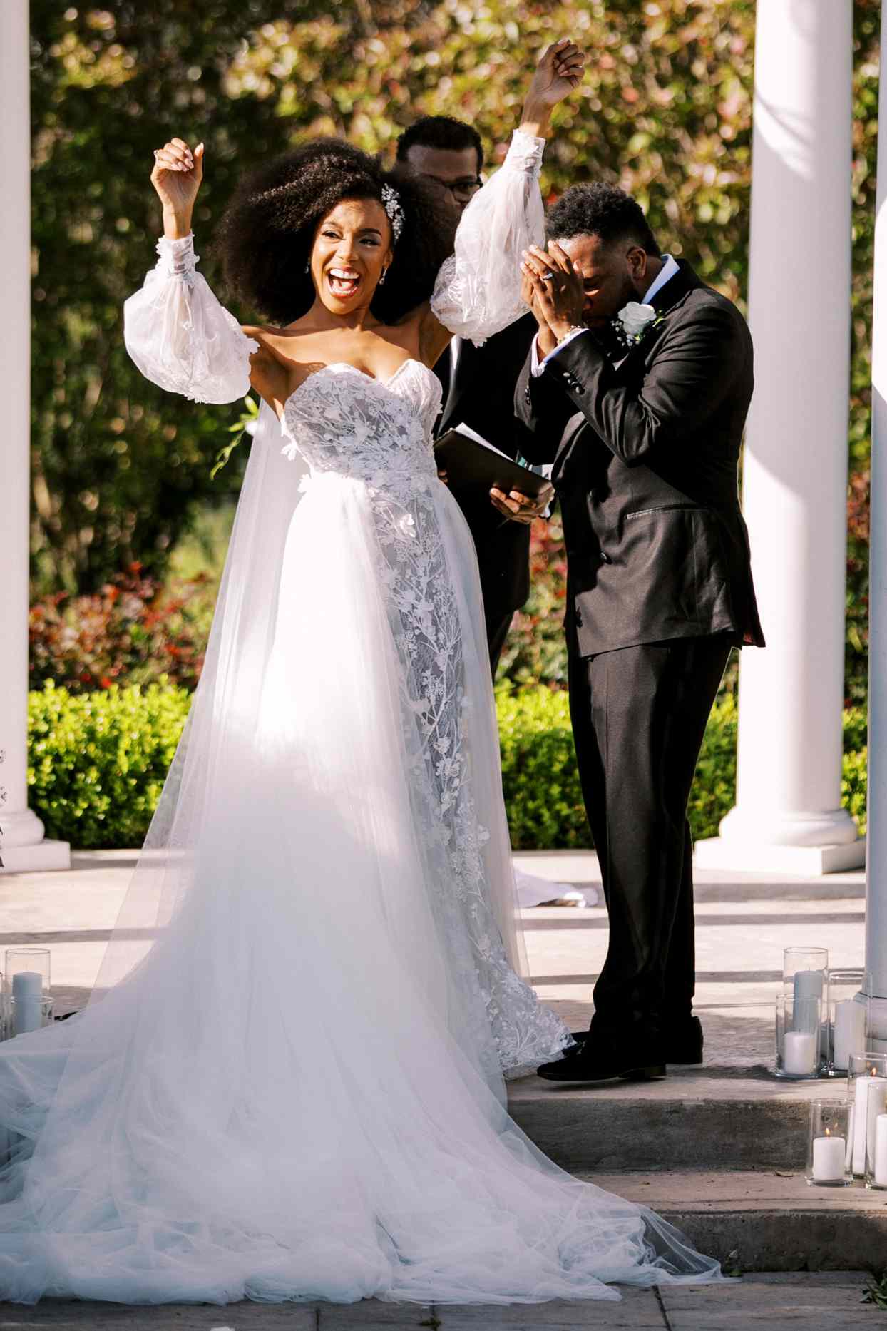 bride and groom celebrate during wedding ceremony