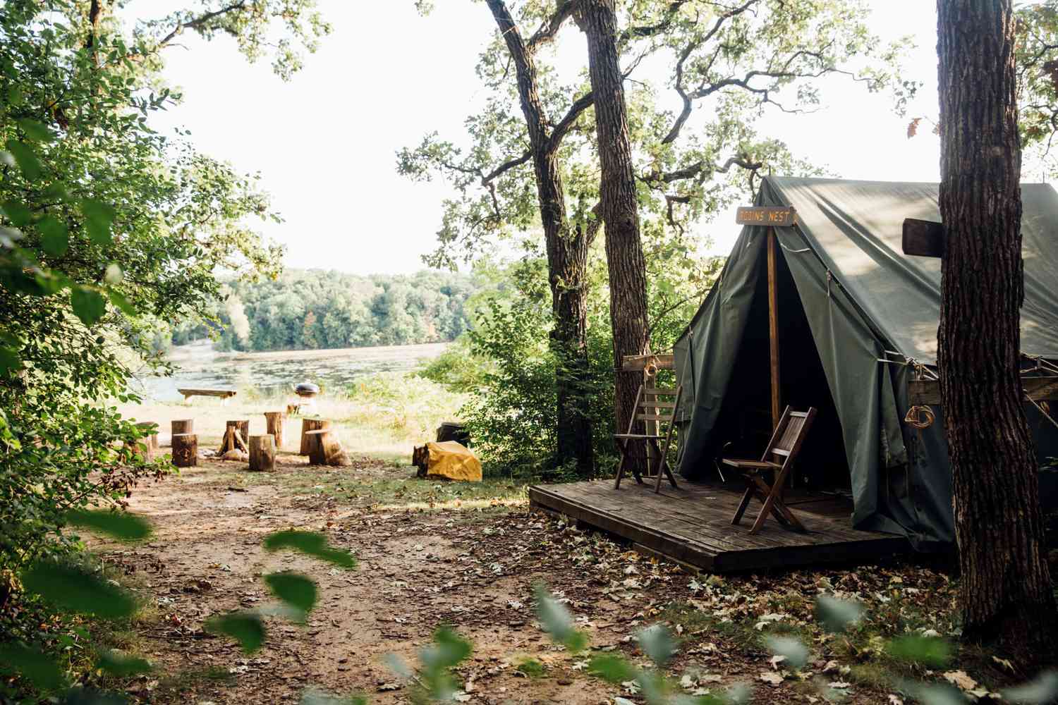 camp wandawega tent exterior with lake view