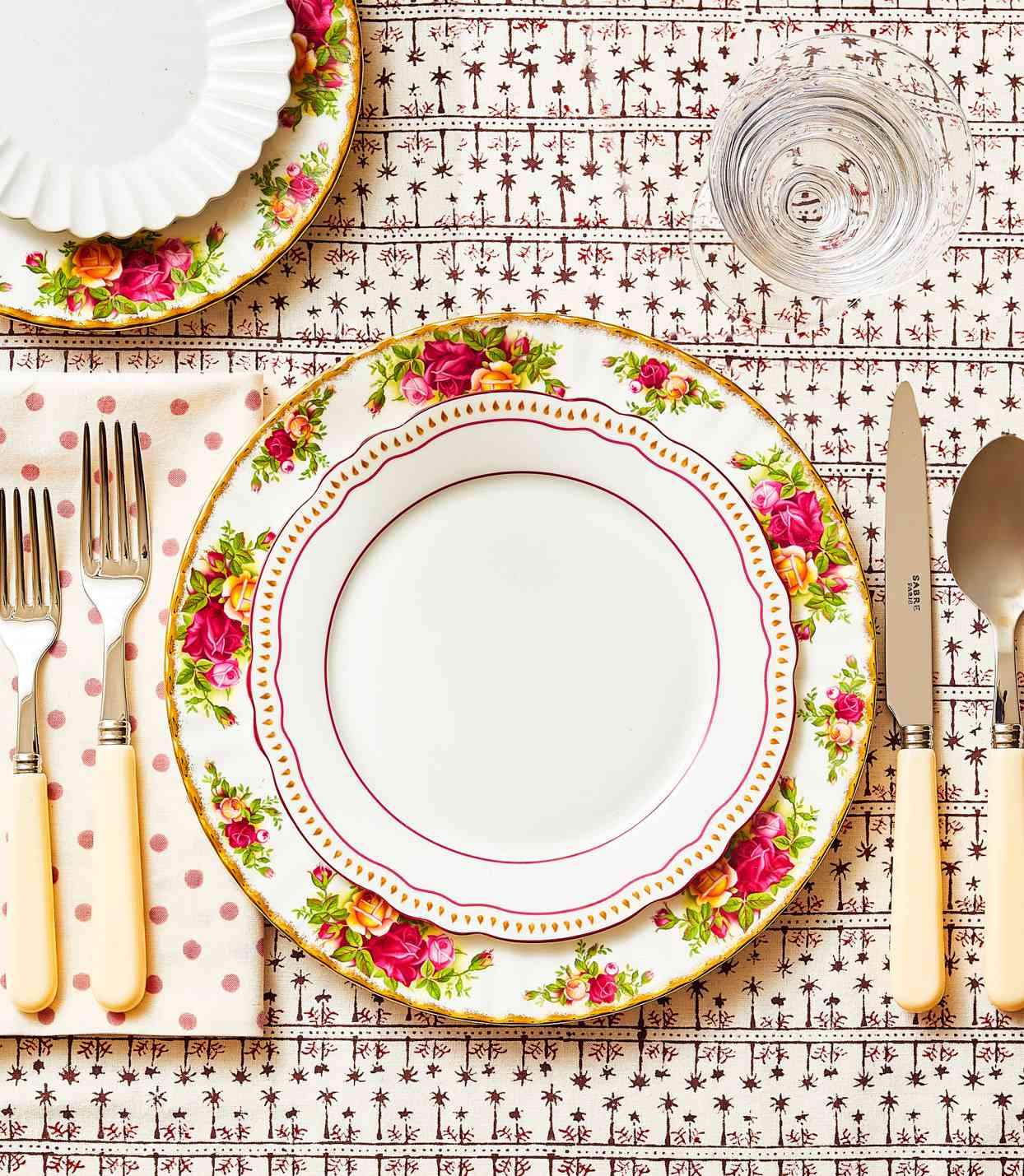 pink and gold rose beds place setting