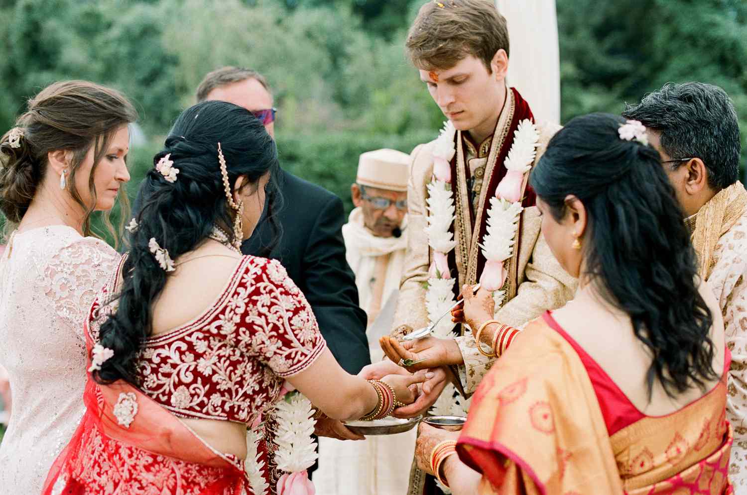 bride and groom and guests during indian wedding ceremony