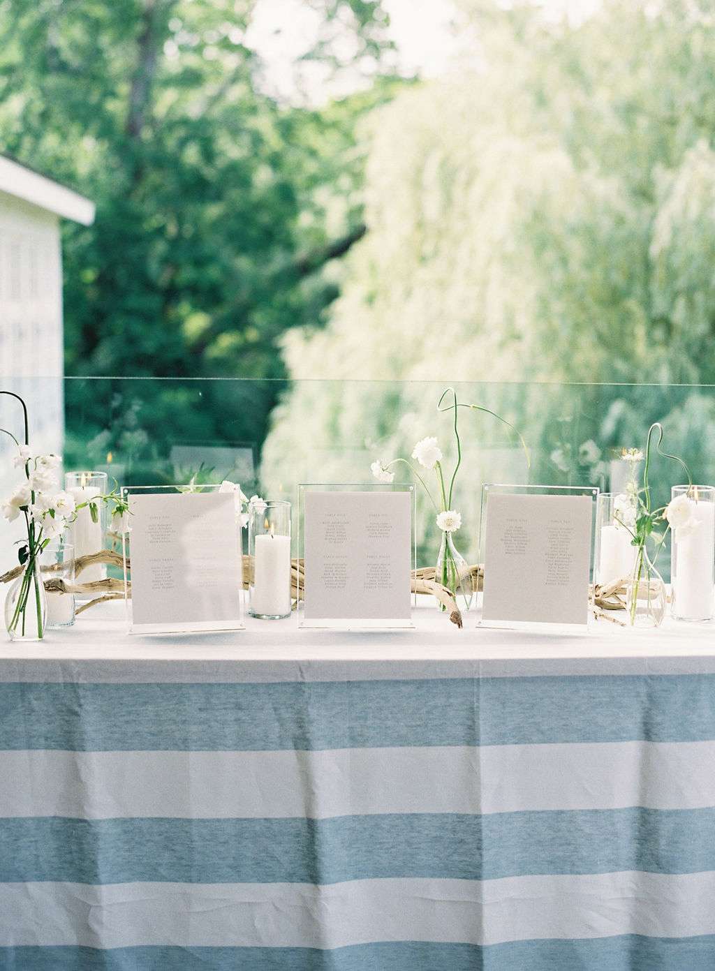 blue and white striped wedding escort card table